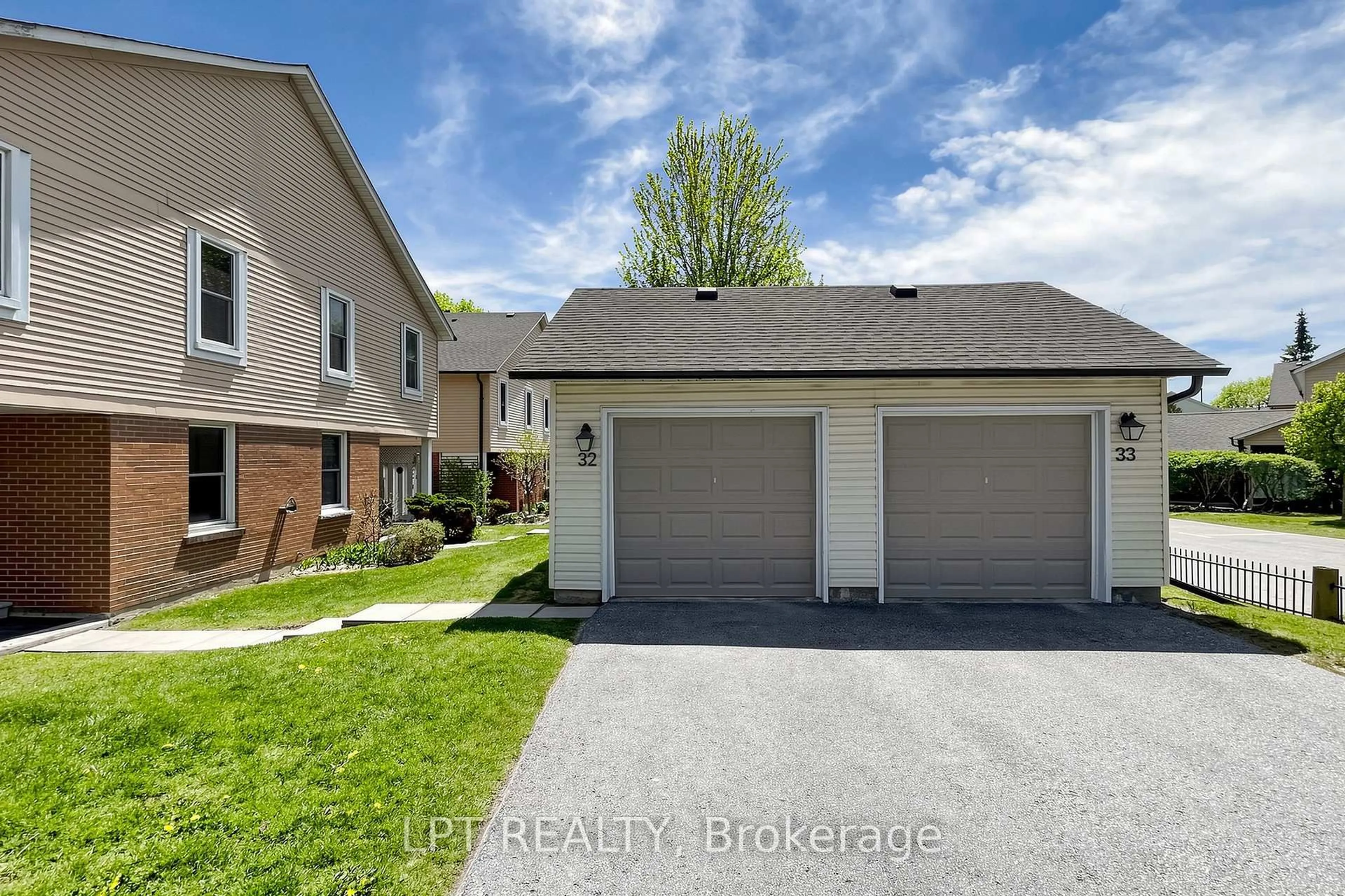 A pic from outside/outdoor area/front of a property/back of a property/a pic from drone, street for 1055 Central Pk Blvd #32, Oshawa Ontario L1G 7M4