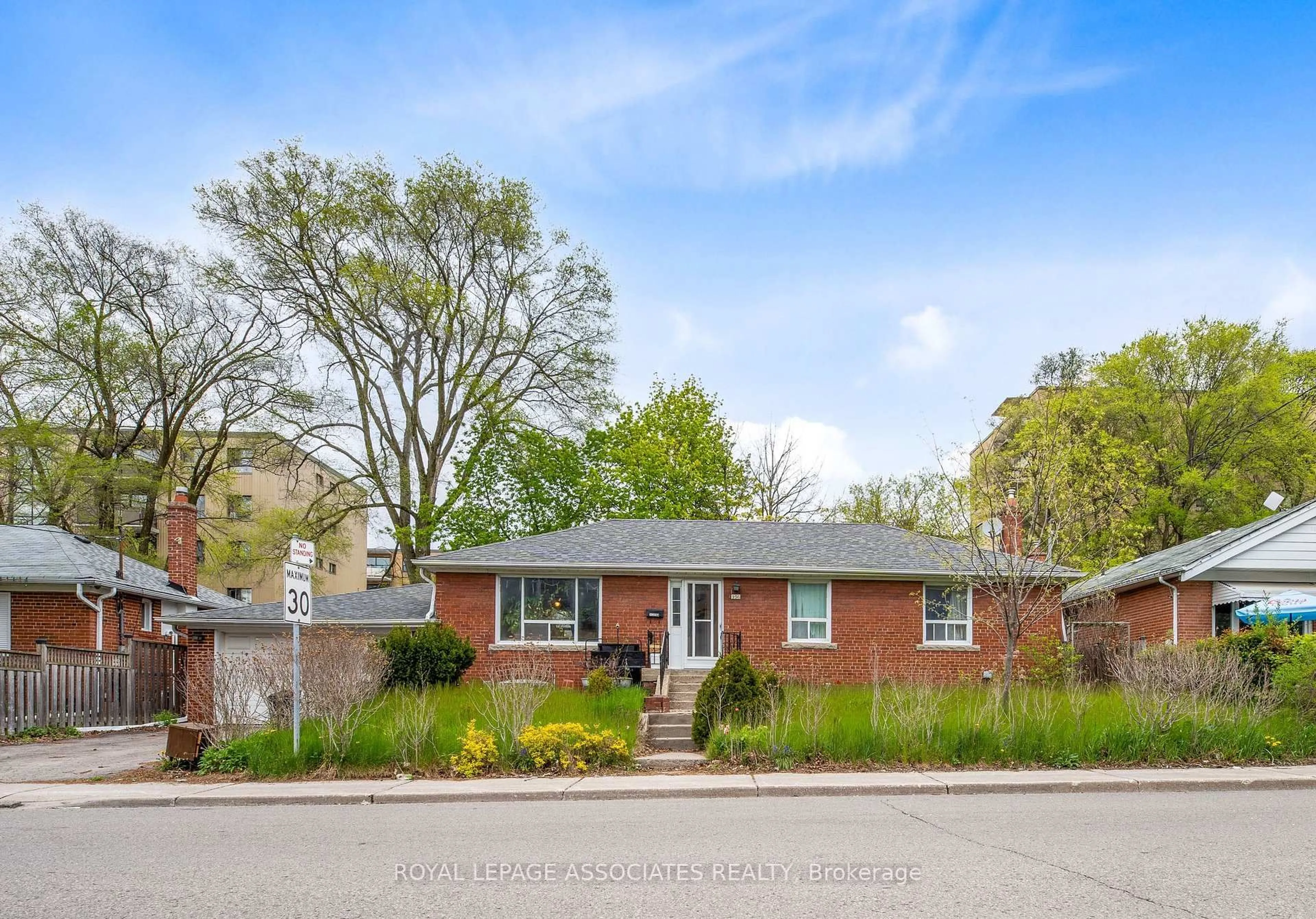 Home with brick exterior material, street for 256 Ferris Rd, Toronto Ontario M4B 1H6