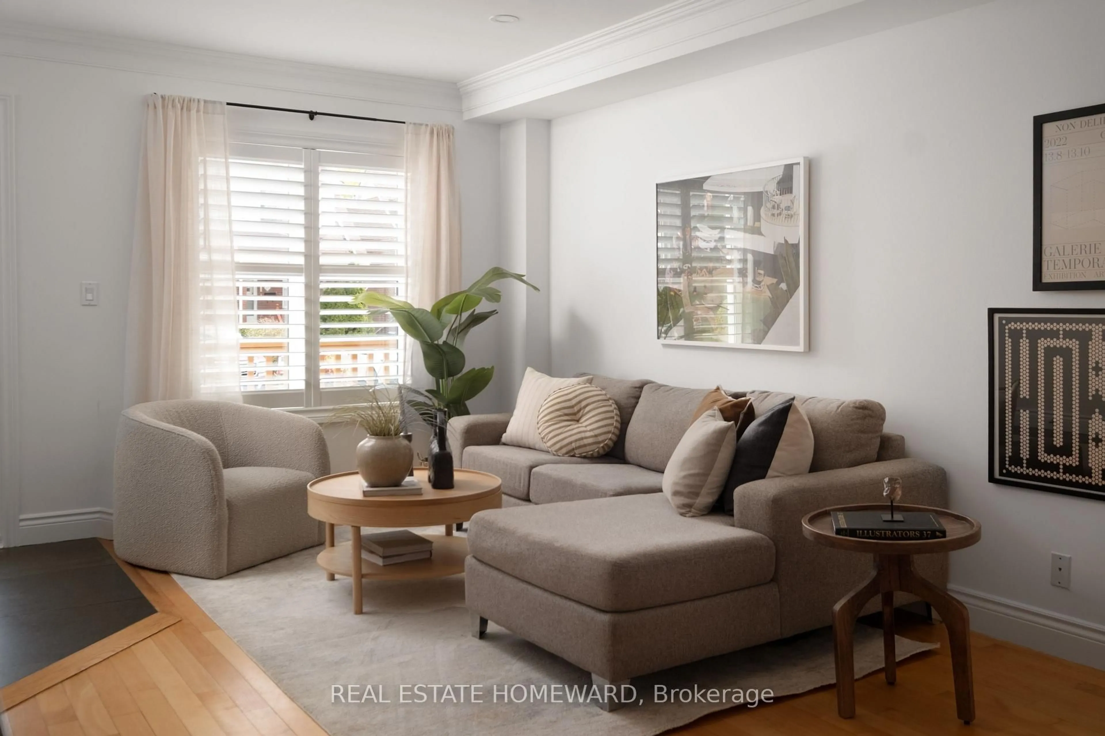 Living room with furniture, wood/laminate floor for 22 Kimbourne Ave, Toronto Ontario M4J 4J2