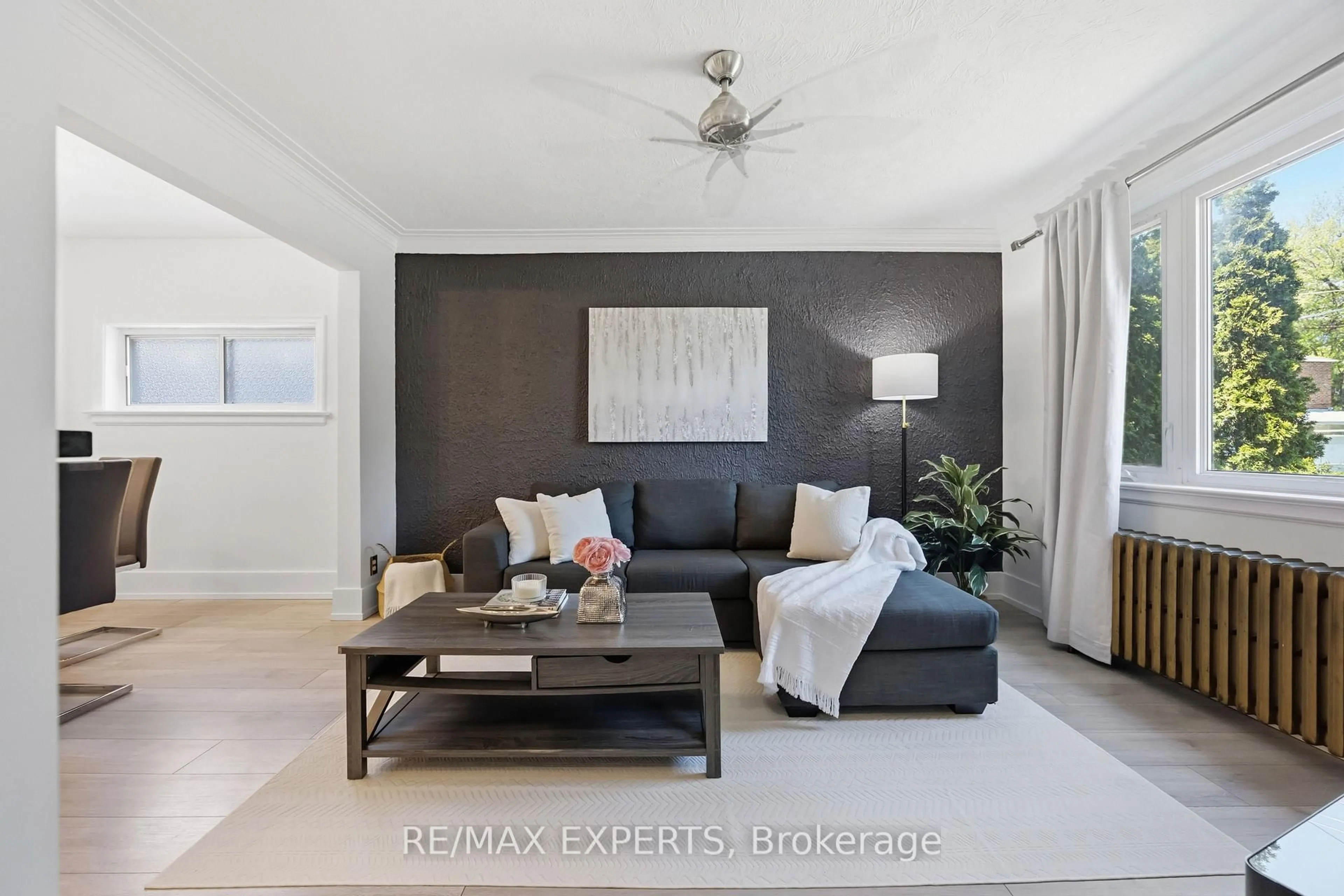 Living room with furniture, unknown for 221 Clonmore Dr, Toronto Ontario M1N 1Y4
