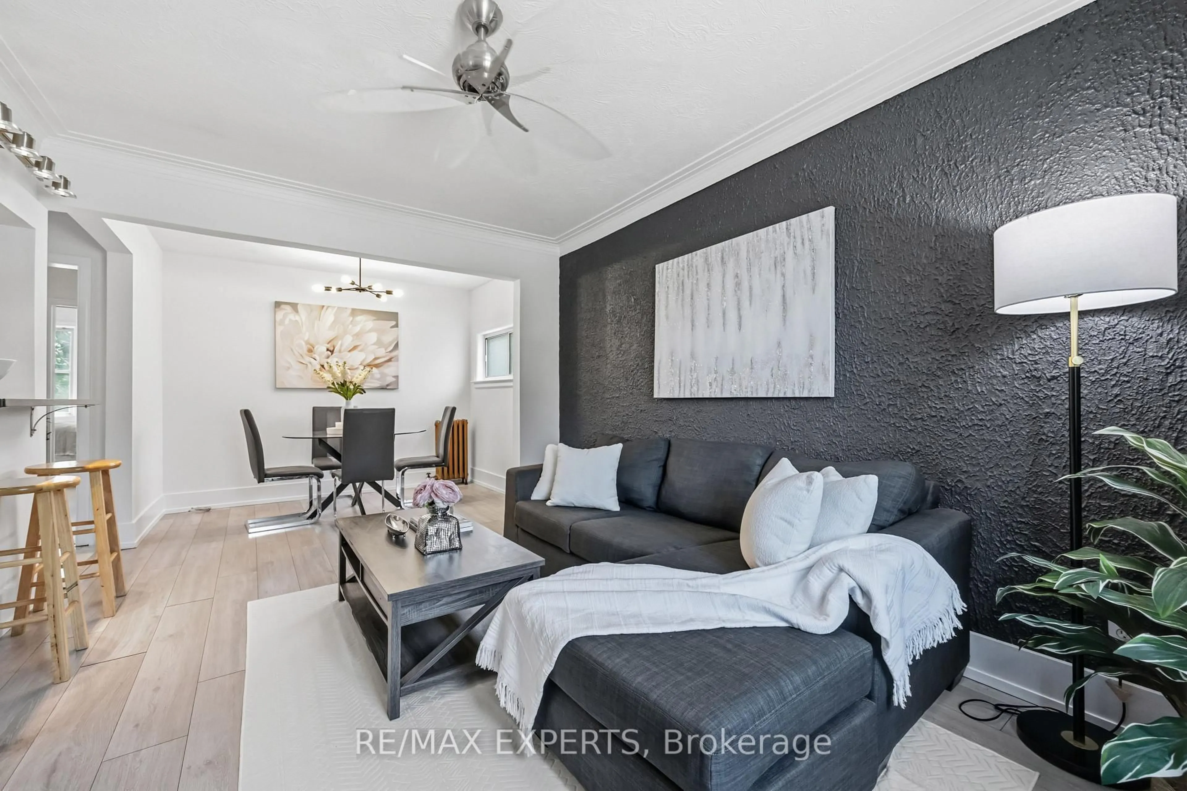 Living room with furniture, unknown for 221 Clonmore Dr, Toronto Ontario M1N 1Y4
