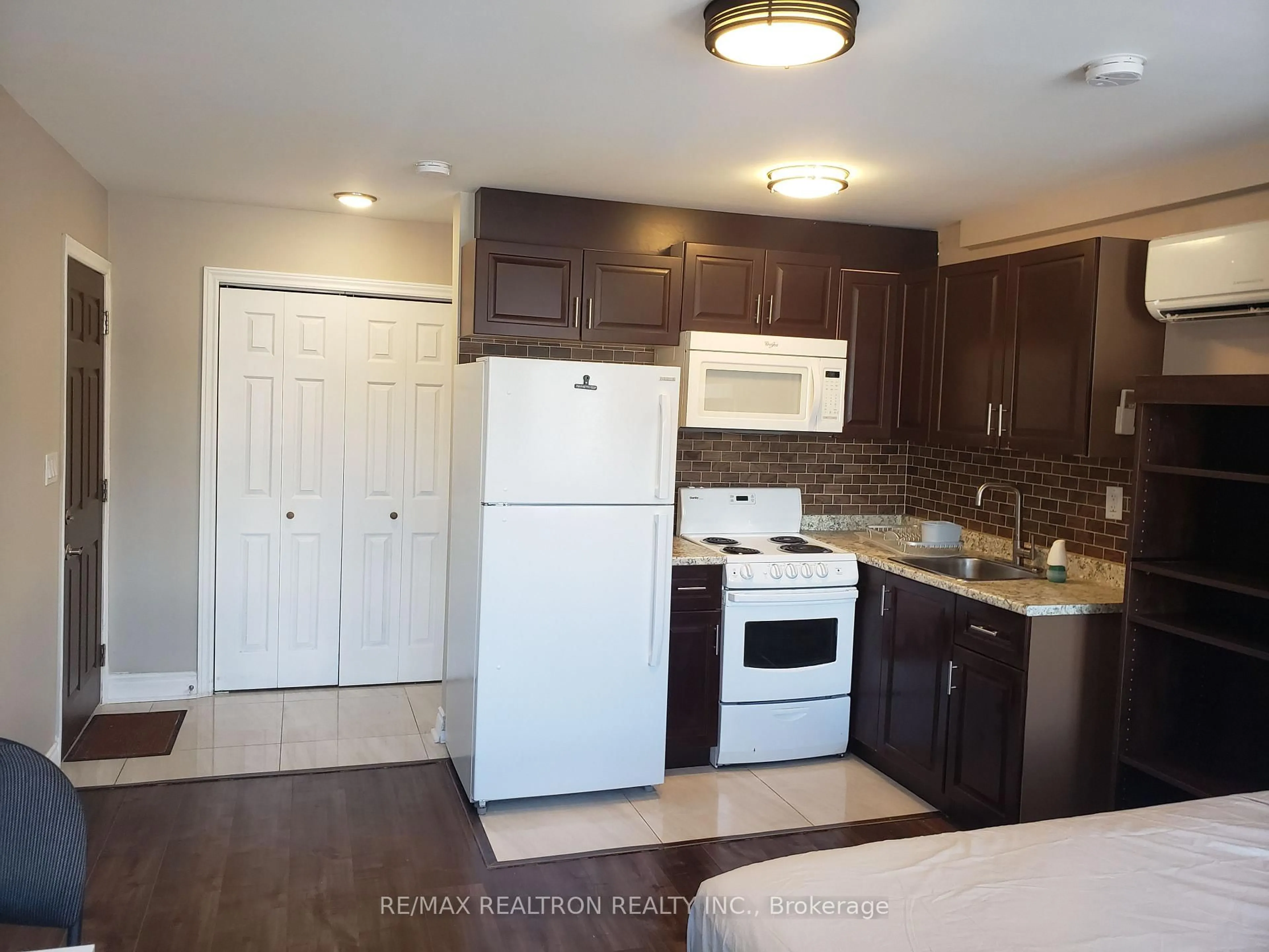 Standard kitchen, wood/laminate floor for 1301 Danforth Ave #1299, Toronto Ontario M4J 1M8
