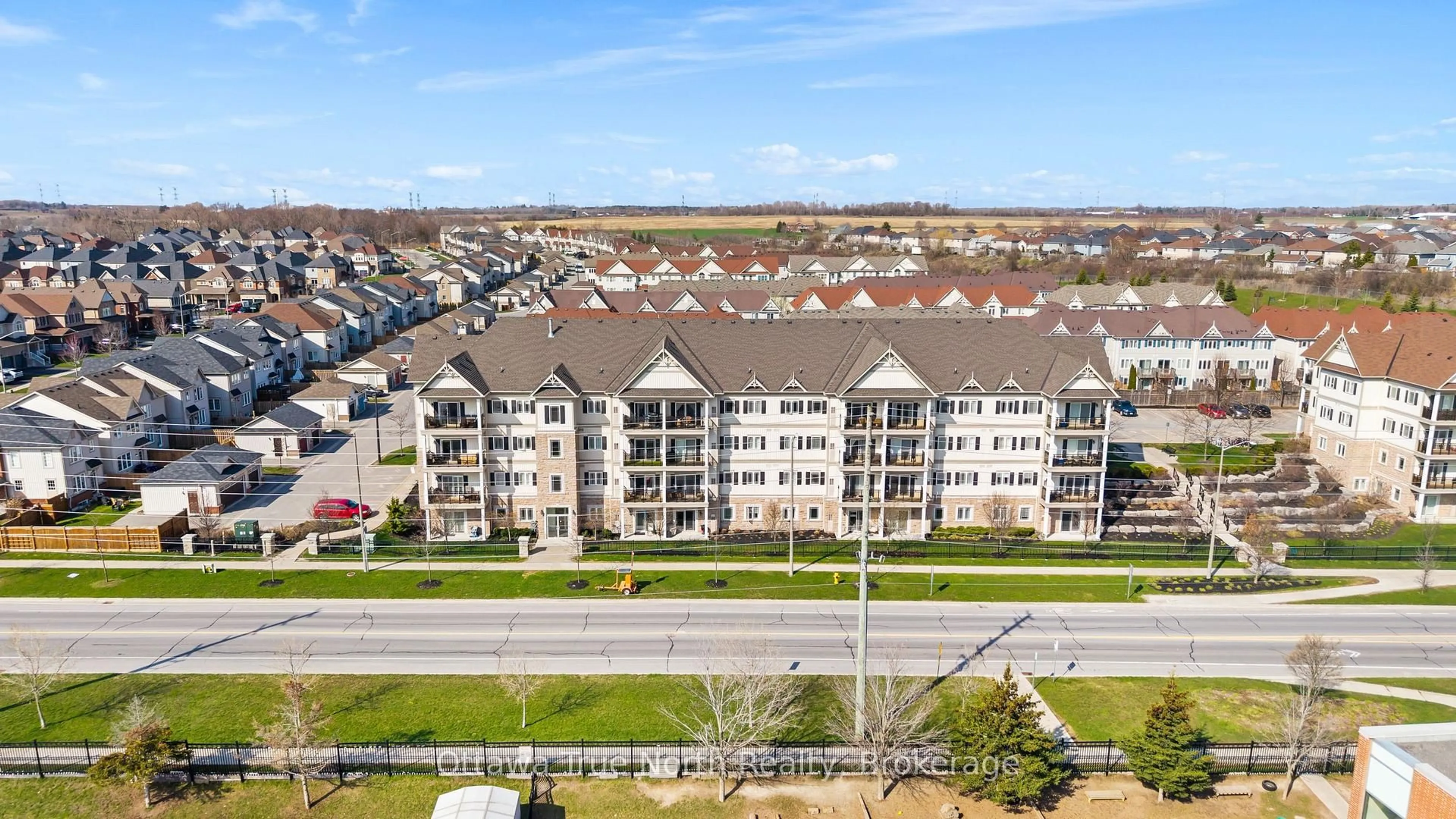 A pic from outside/outdoor area/front of a property/back of a property/a pic from drone, city buildings view from balcony for 1 Sidney Lane #303, Clarington Ontario L1C 0N5