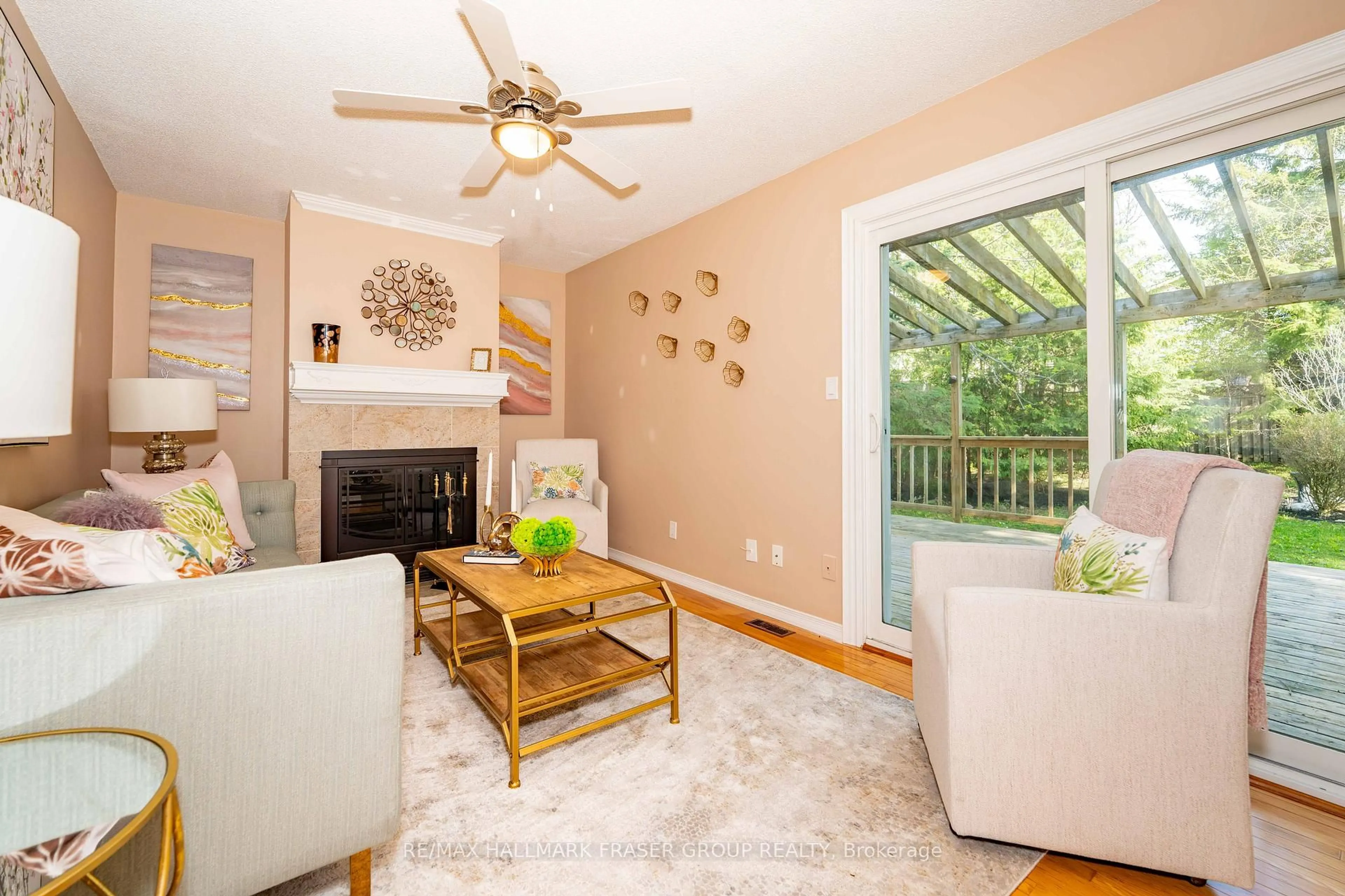 Living room with furniture, wood/laminate floor for 692 Avery Crt, Oshawa Ontario L1K 1S8