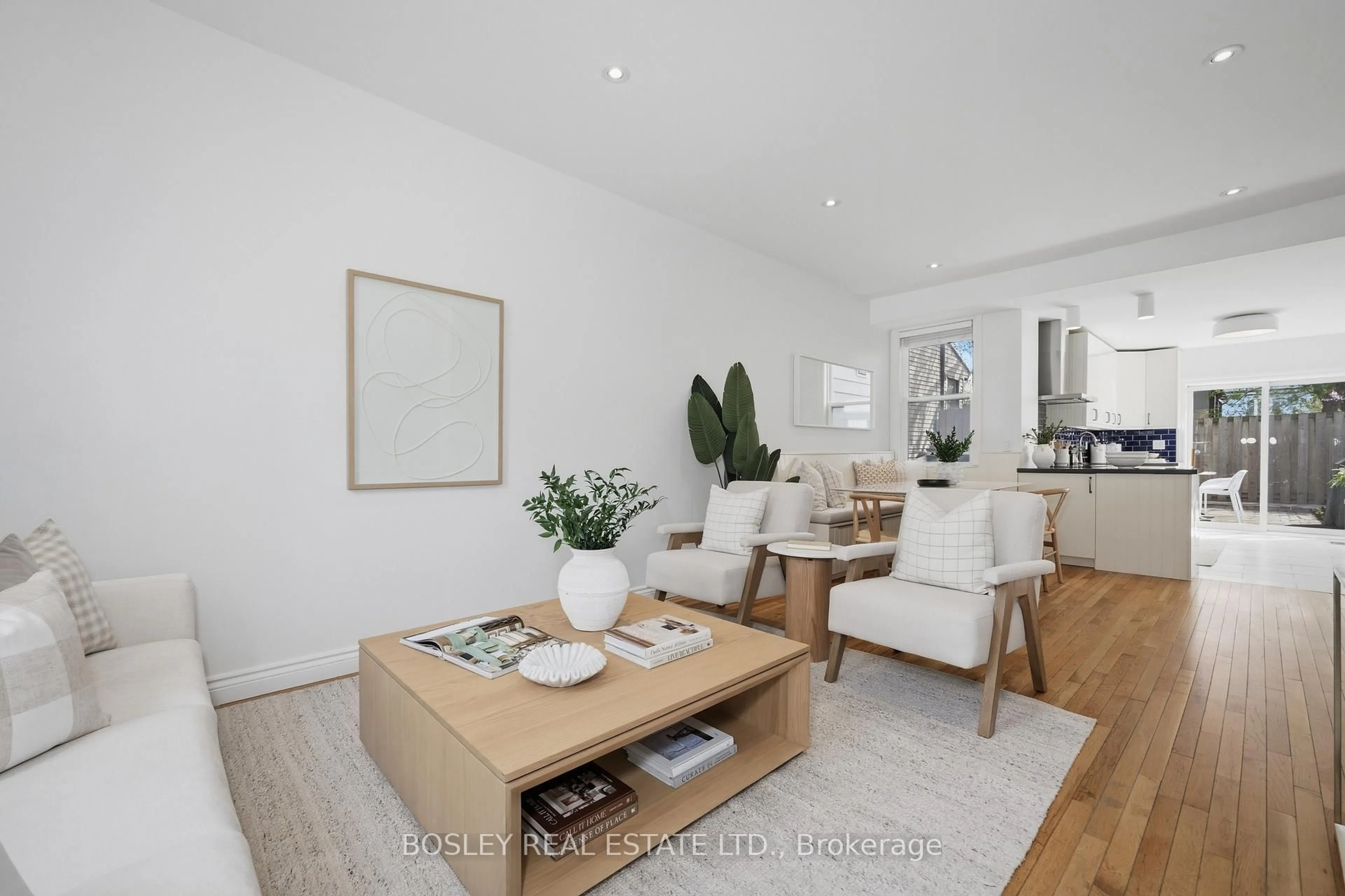 Living room with furniture, wood/laminate floor for 119 Hamilton St, Toronto Ontario M4M 2C7