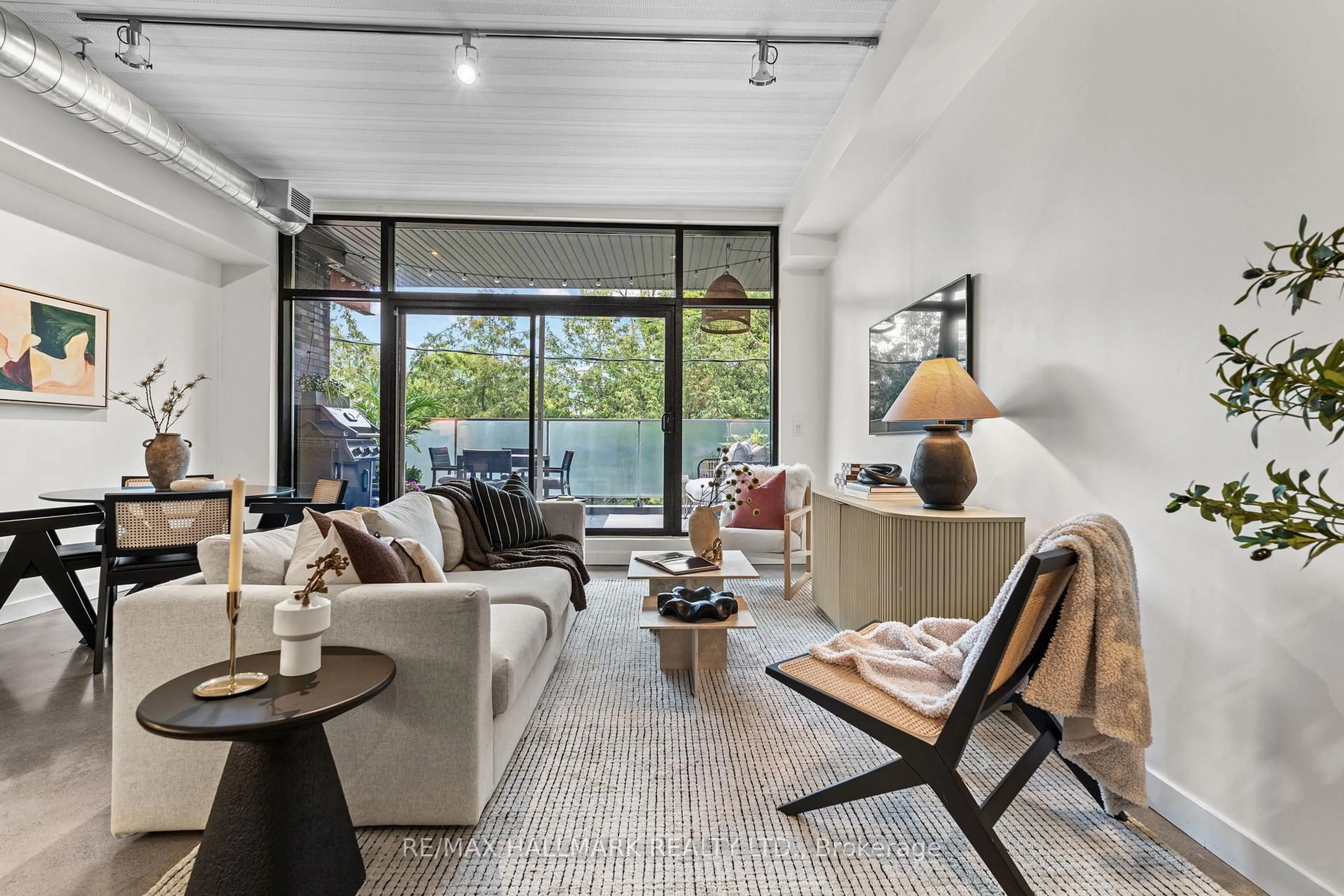 Living room with furniture, unknown for 747 Queen St #202, Toronto Ontario M4M 1H3