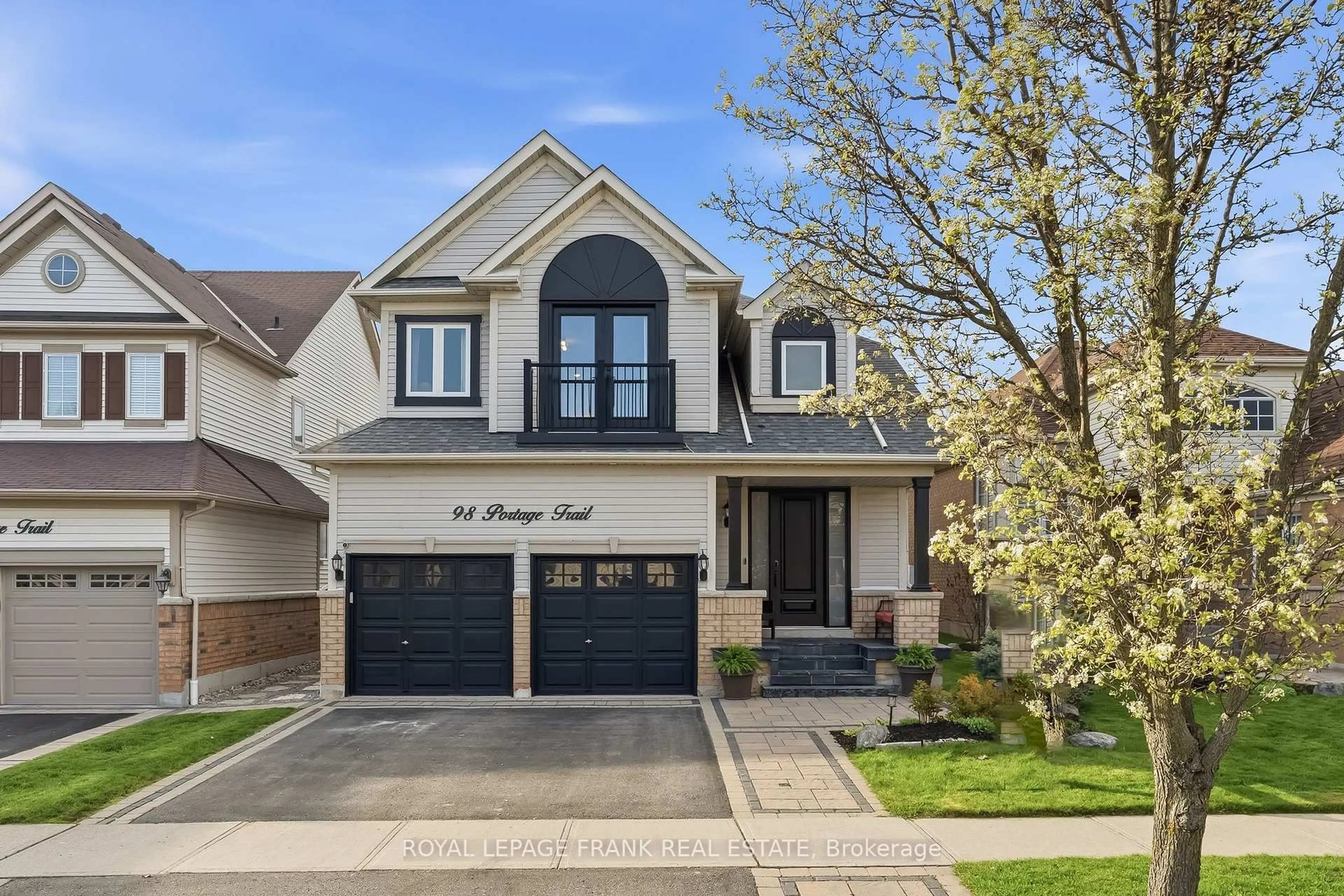 Home with brick exterior material, street for 98 Portage Tr, Whitby Ontario L1N 9N8