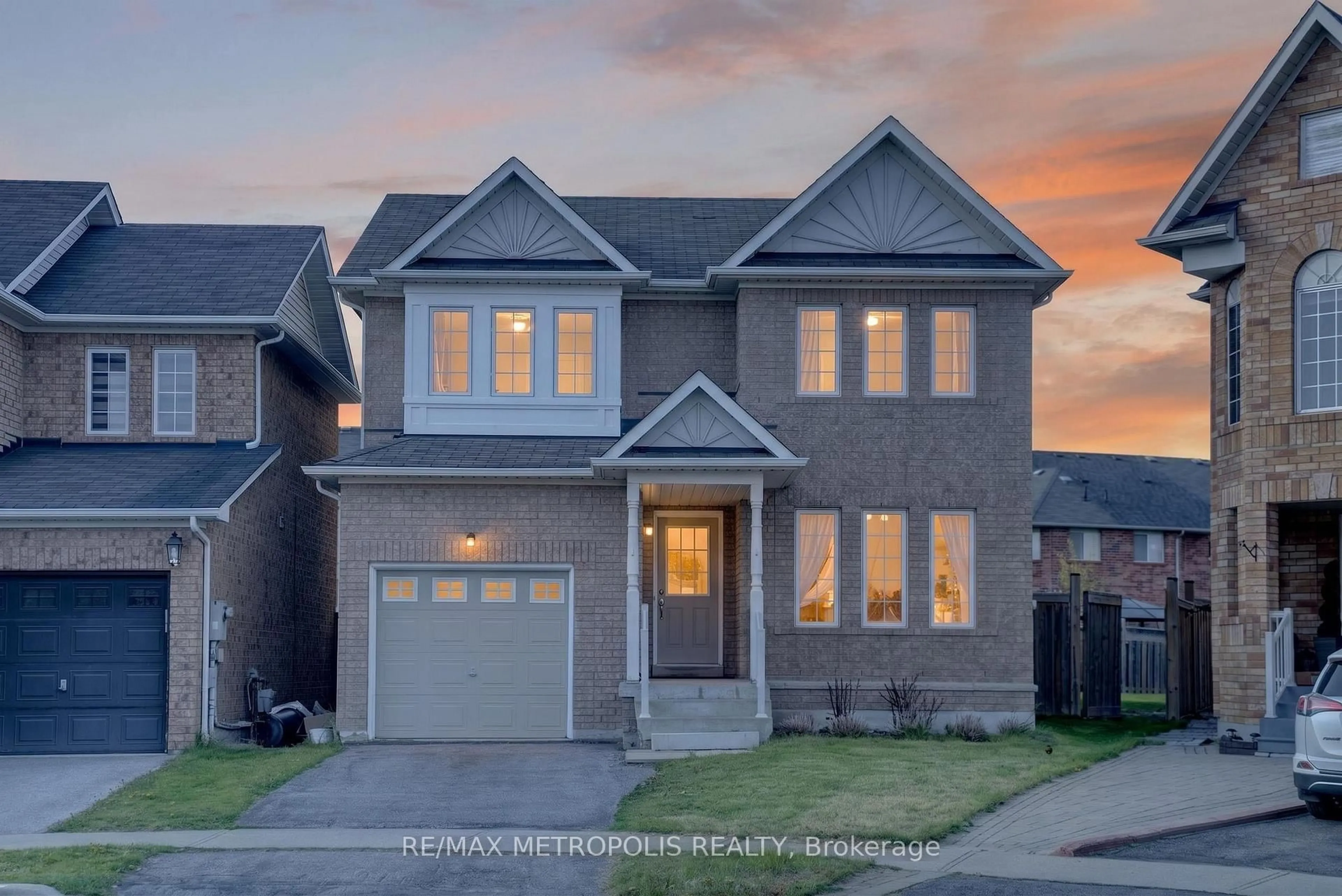 Home with brick exterior material, street for 83 Greenhalf Dr, Ajax Ontario L1S 7R6