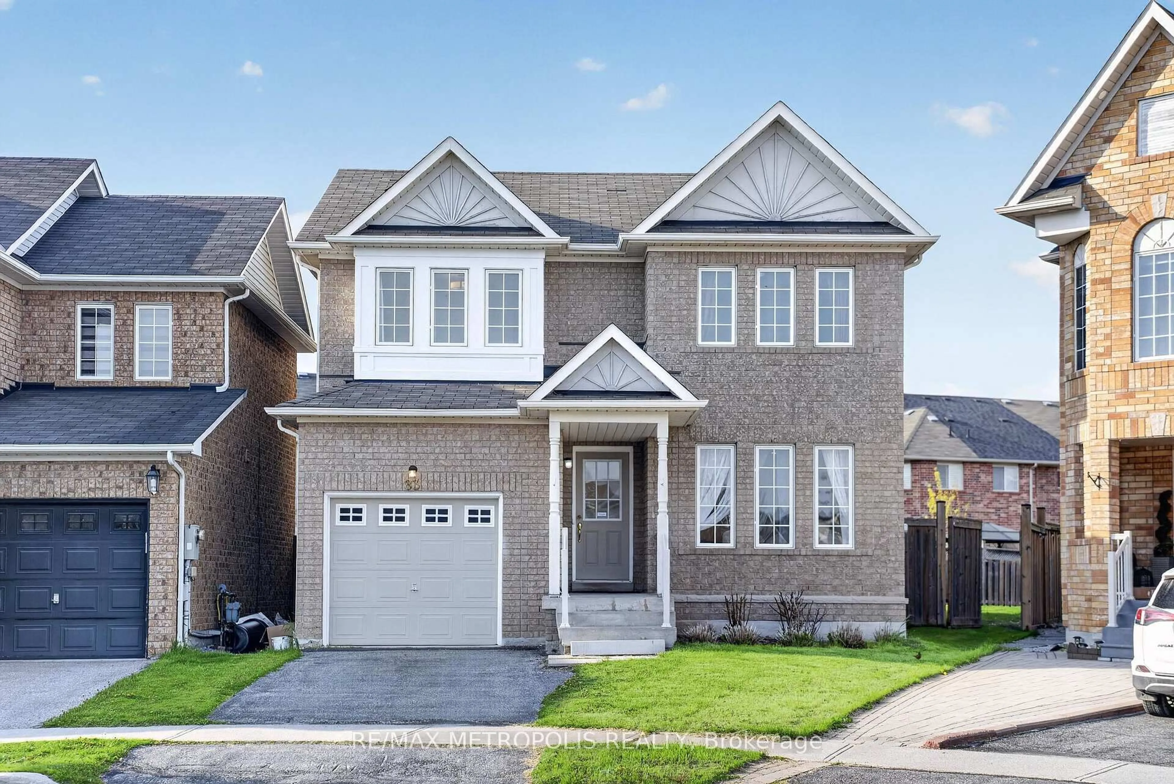 Home with brick exterior material, street for 83 Greenhalf Dr, Ajax Ontario L1S 7R6