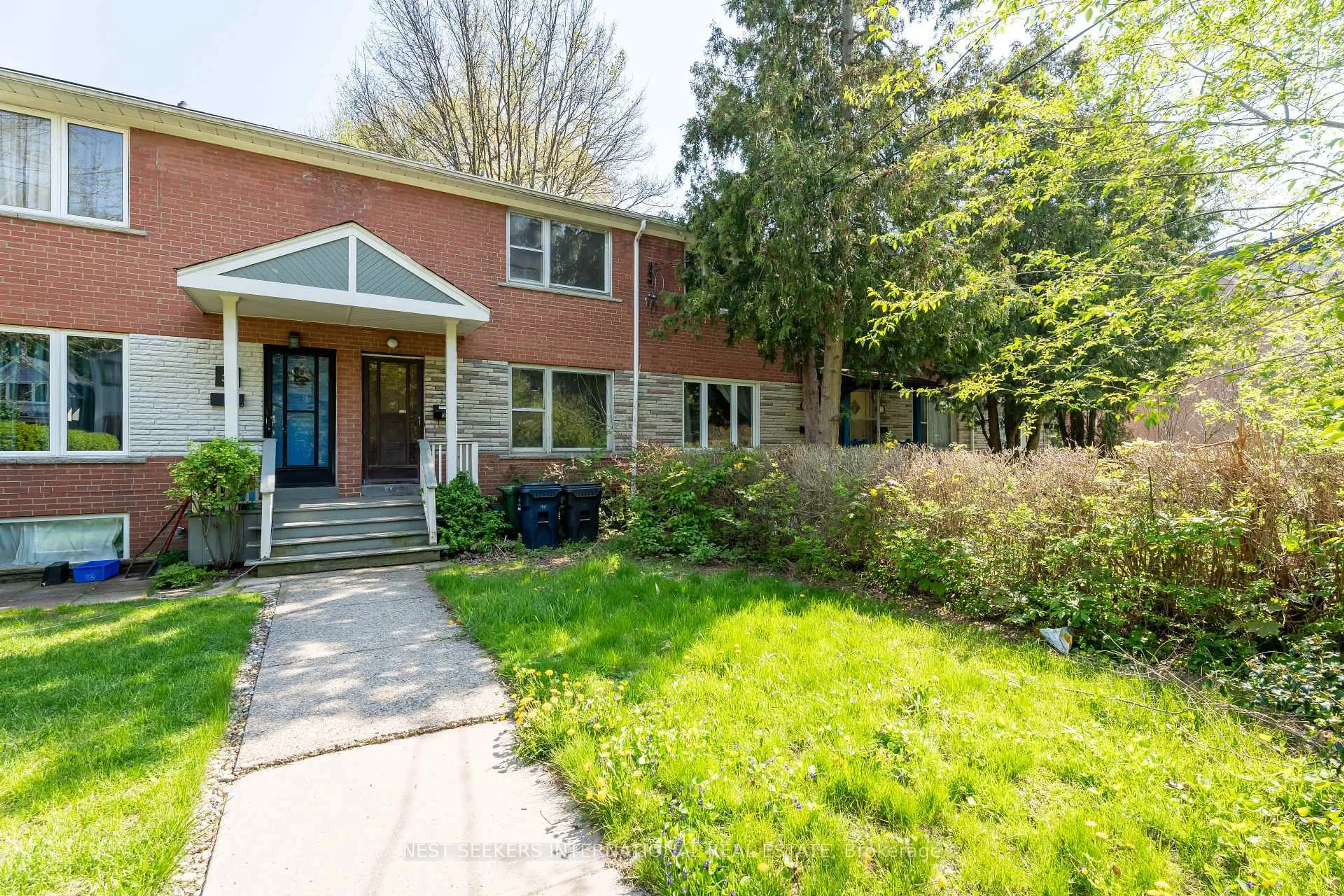 Home with brick exterior material, street for 31 Ivy Ave, Toronto Ontario M4L 2H6