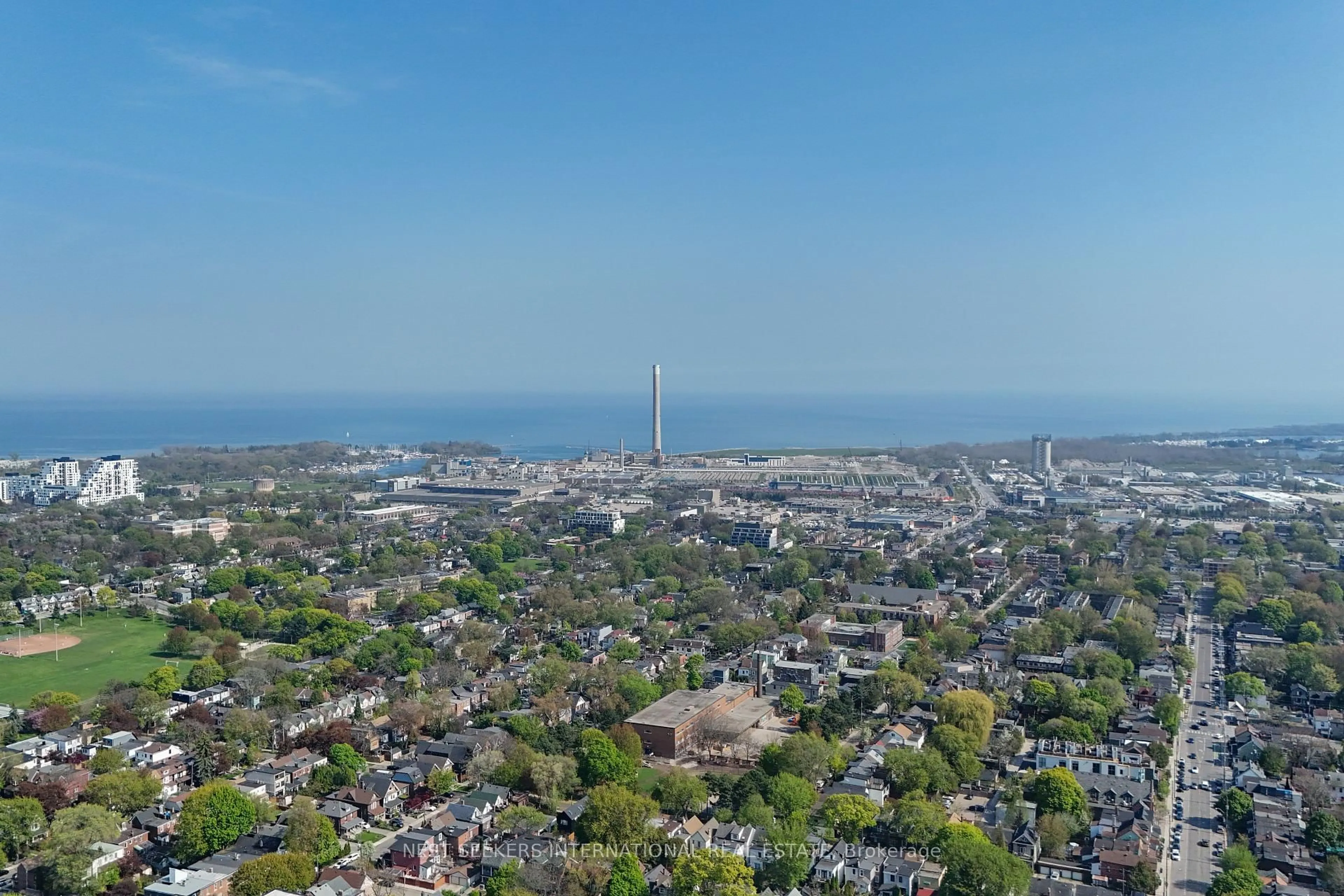 A pic from outside/outdoor area/front of a property/back of a property/a pic from drone, city buildings view from balcony for 31 Ivy Ave, Toronto Ontario M4L 2H6