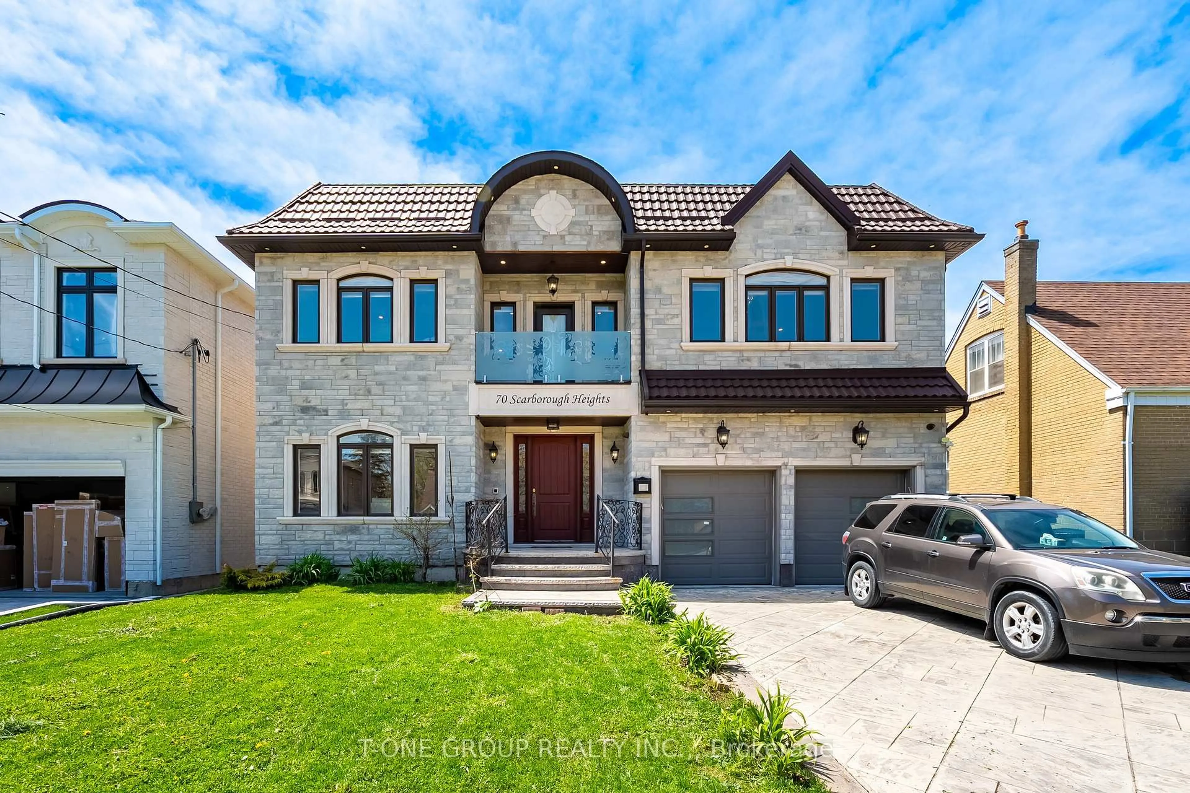 Home with brick exterior material, street for 70 Scarborough Heights Blvd, Toronto Ontario M1M 2V4