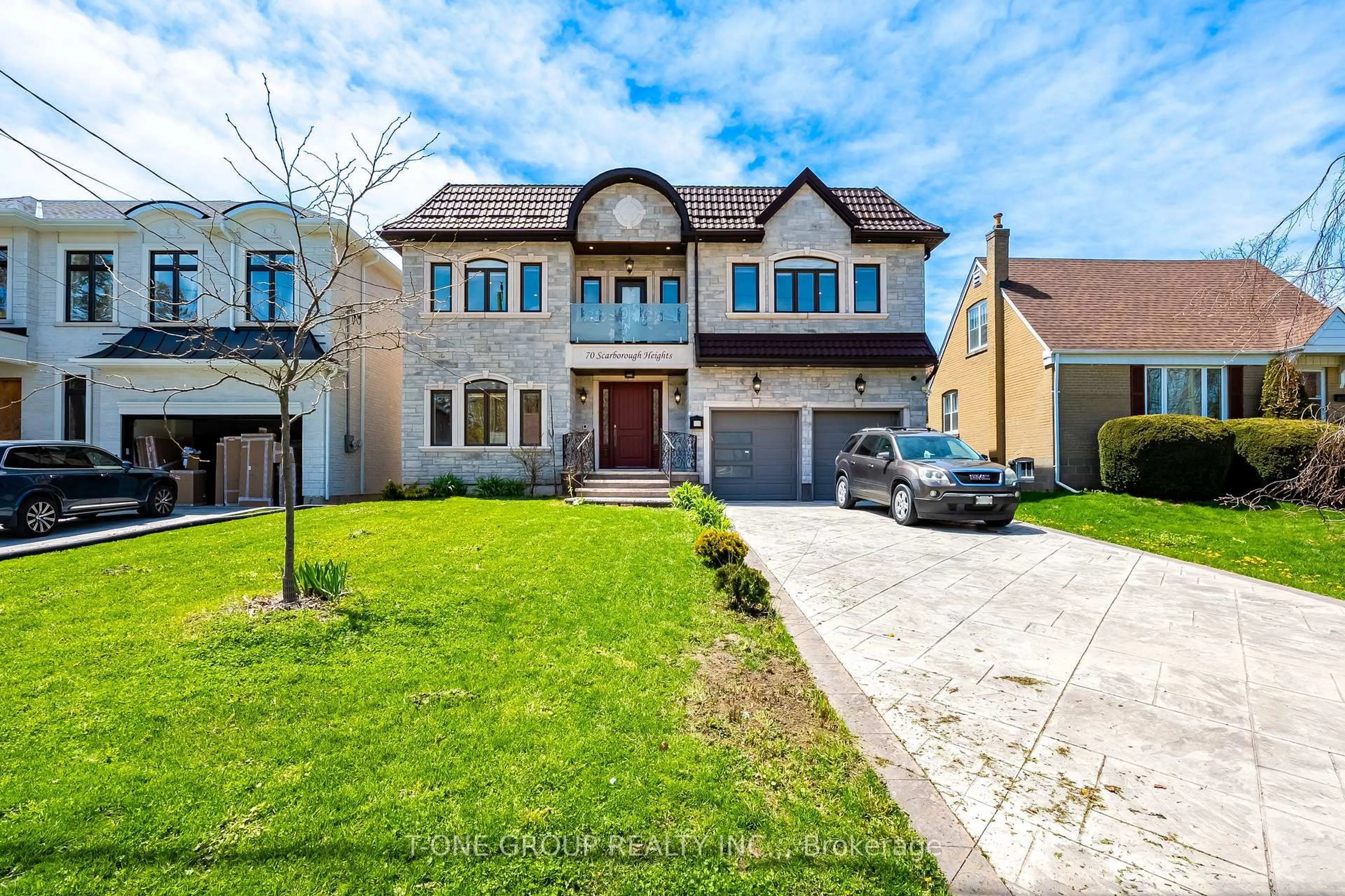 Home with brick exterior material, street for 70 Scarborough Heights Blvd, Toronto Ontario M1M 2V4