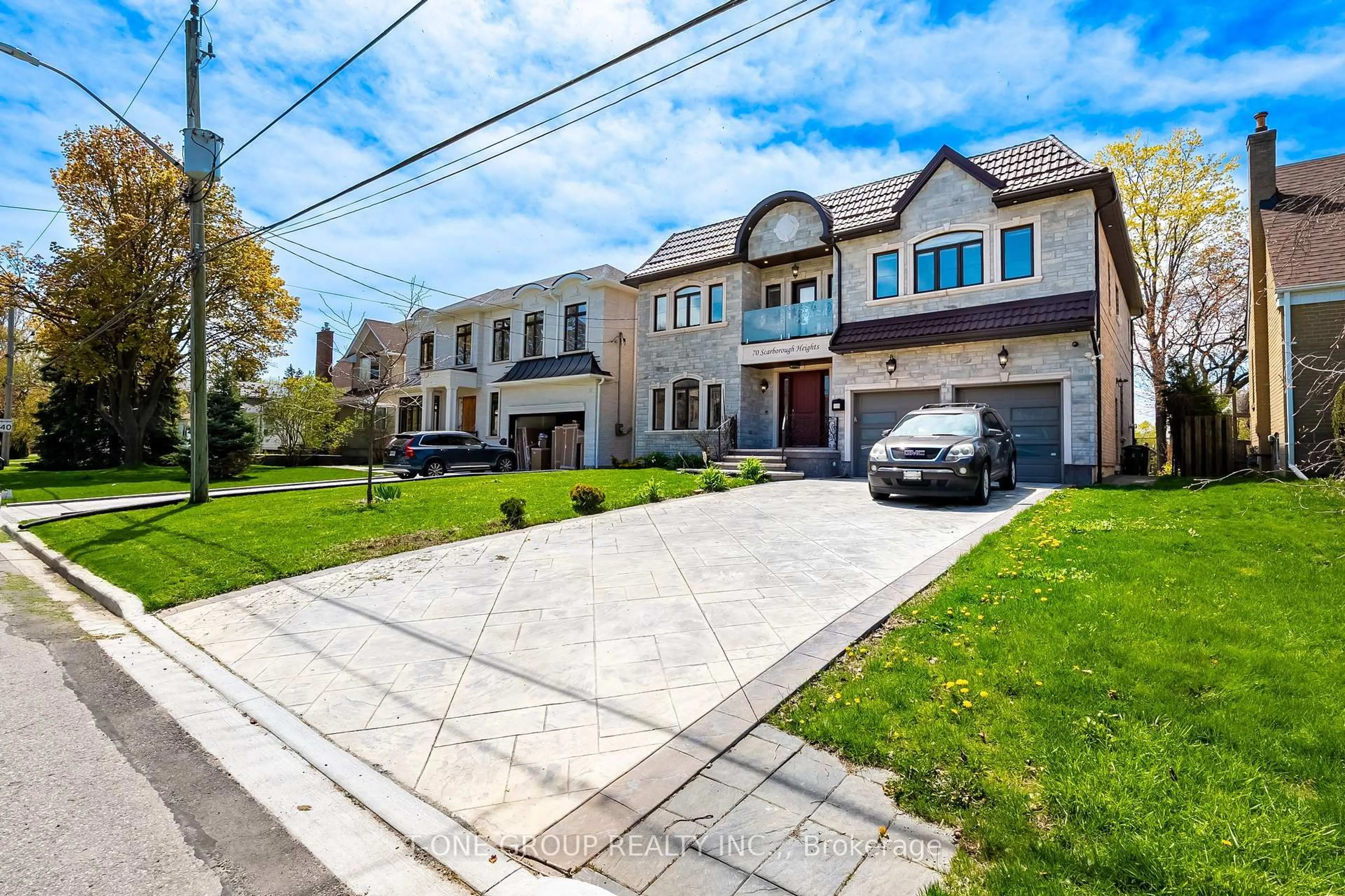 Home with brick exterior material, street for 70 Scarborough Heights Blvd, Toronto Ontario M1M 2V4