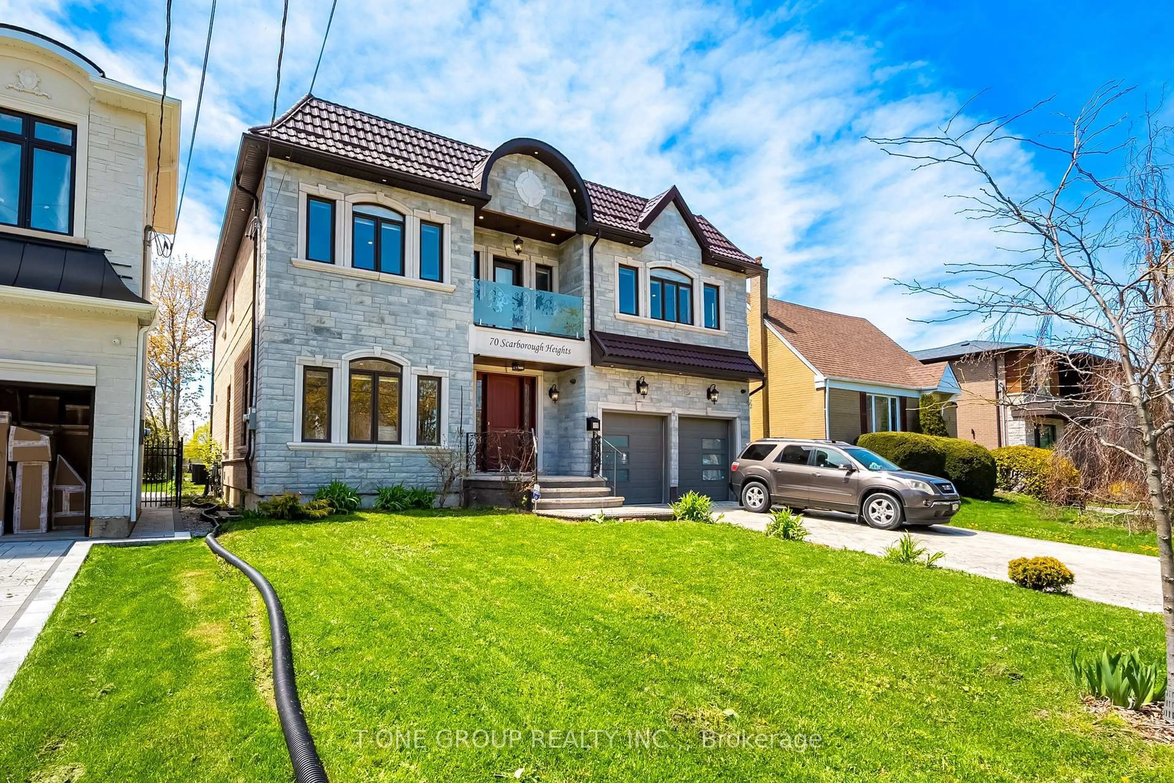 Home with brick exterior material, street for 70 Scarborough Heights Blvd, Toronto Ontario M1M 2V4