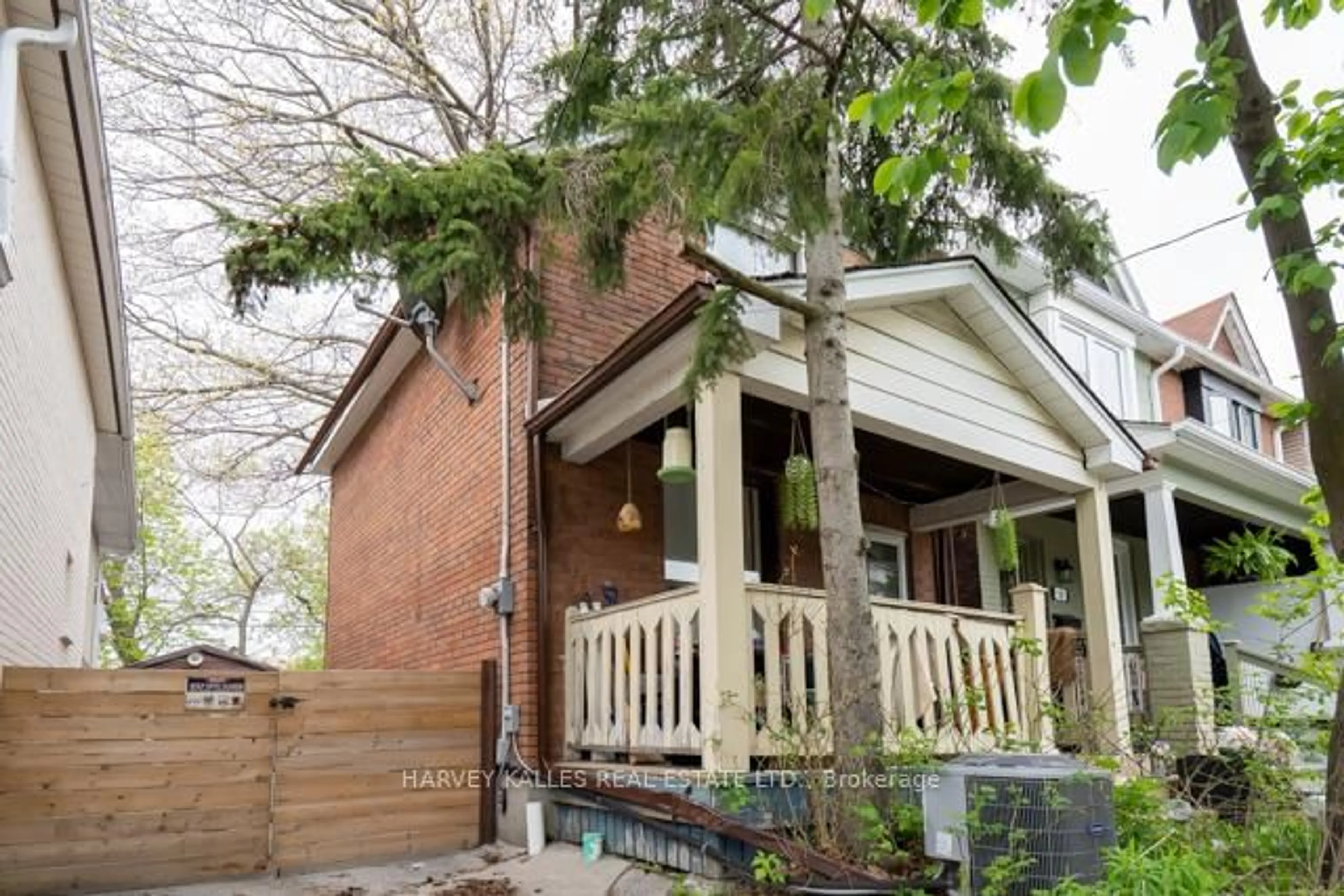 Home with brick exterior material, street for 56 Amroth Ave, Toronto Ontario M4C 4H2