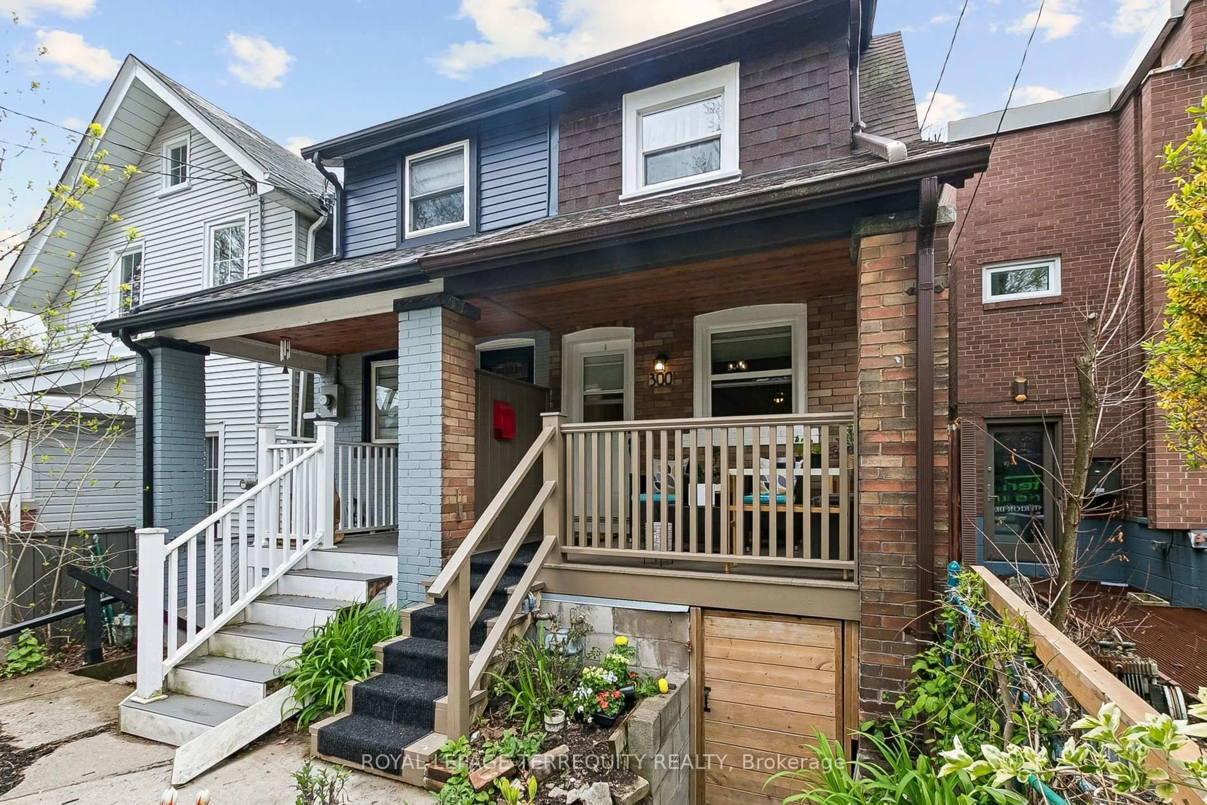 Home with brick exterior material, street for 300 Rhodes Ave, Toronto Ontario M4L 3A3