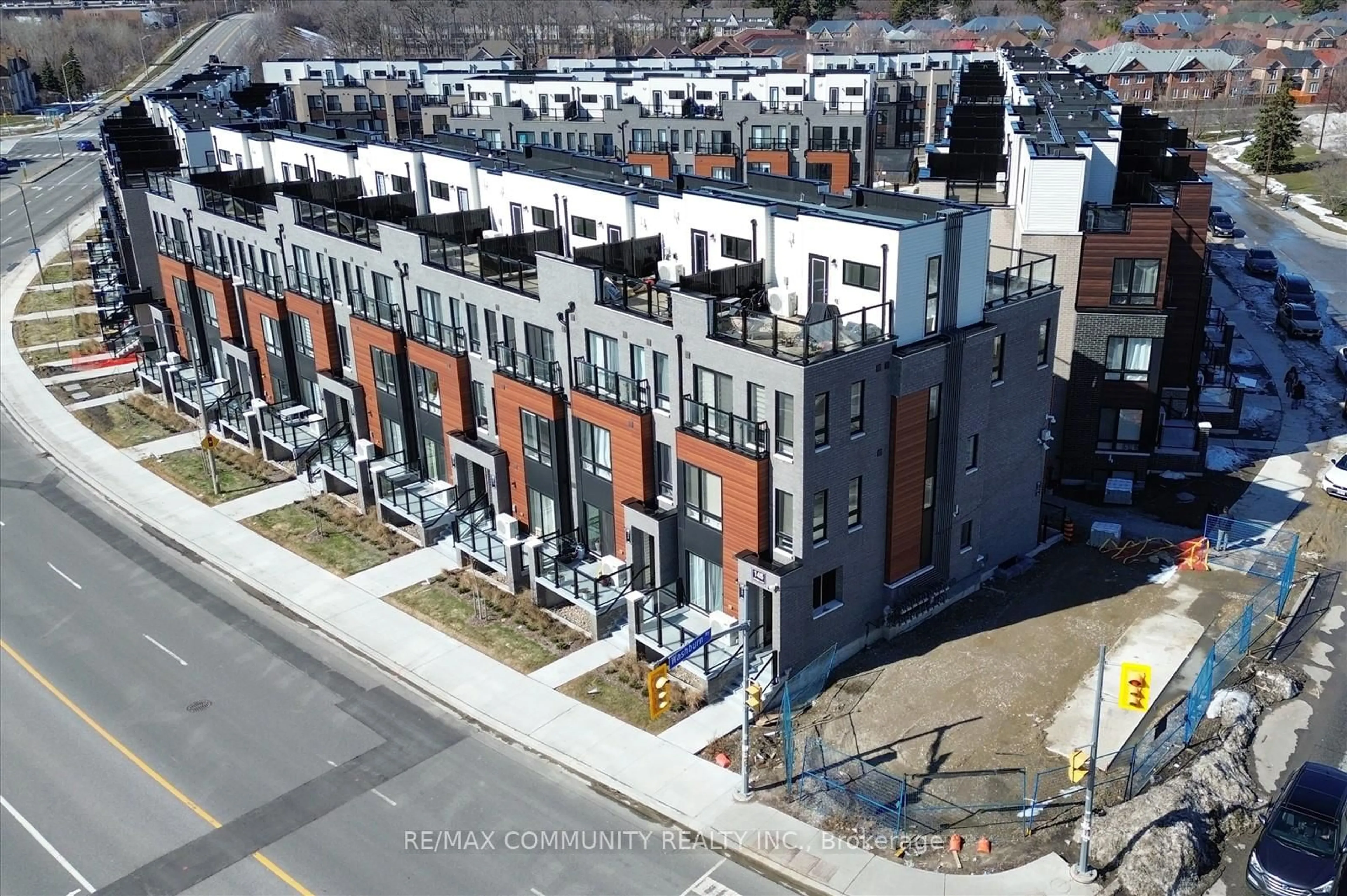 A pic from outside/outdoor area/front of a property/back of a property/a pic from drone, street for 145 Tapscott Rd #21, Toronto Ontario M1B 0E8