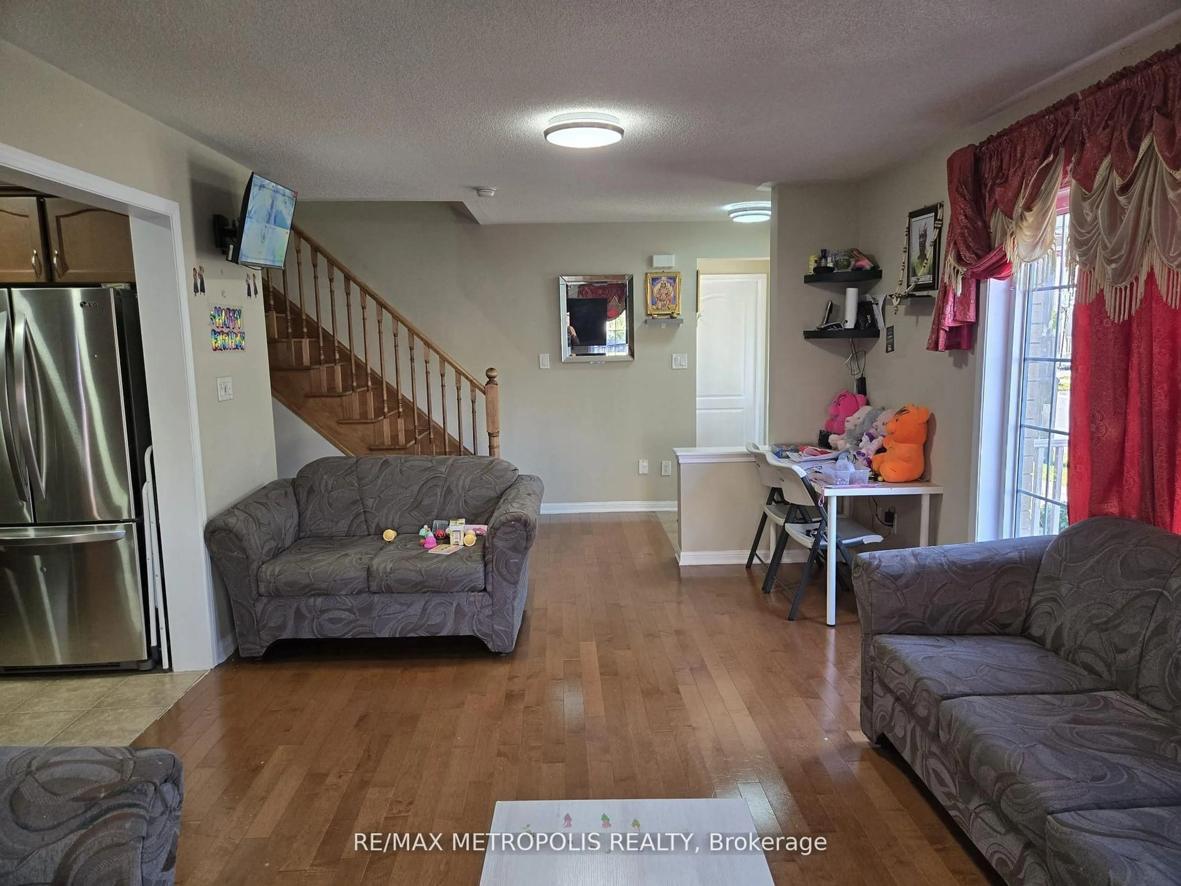 Living room with furniture, unknown for 1913 Liatris Dr, Pickering Ontario L1X 0A7