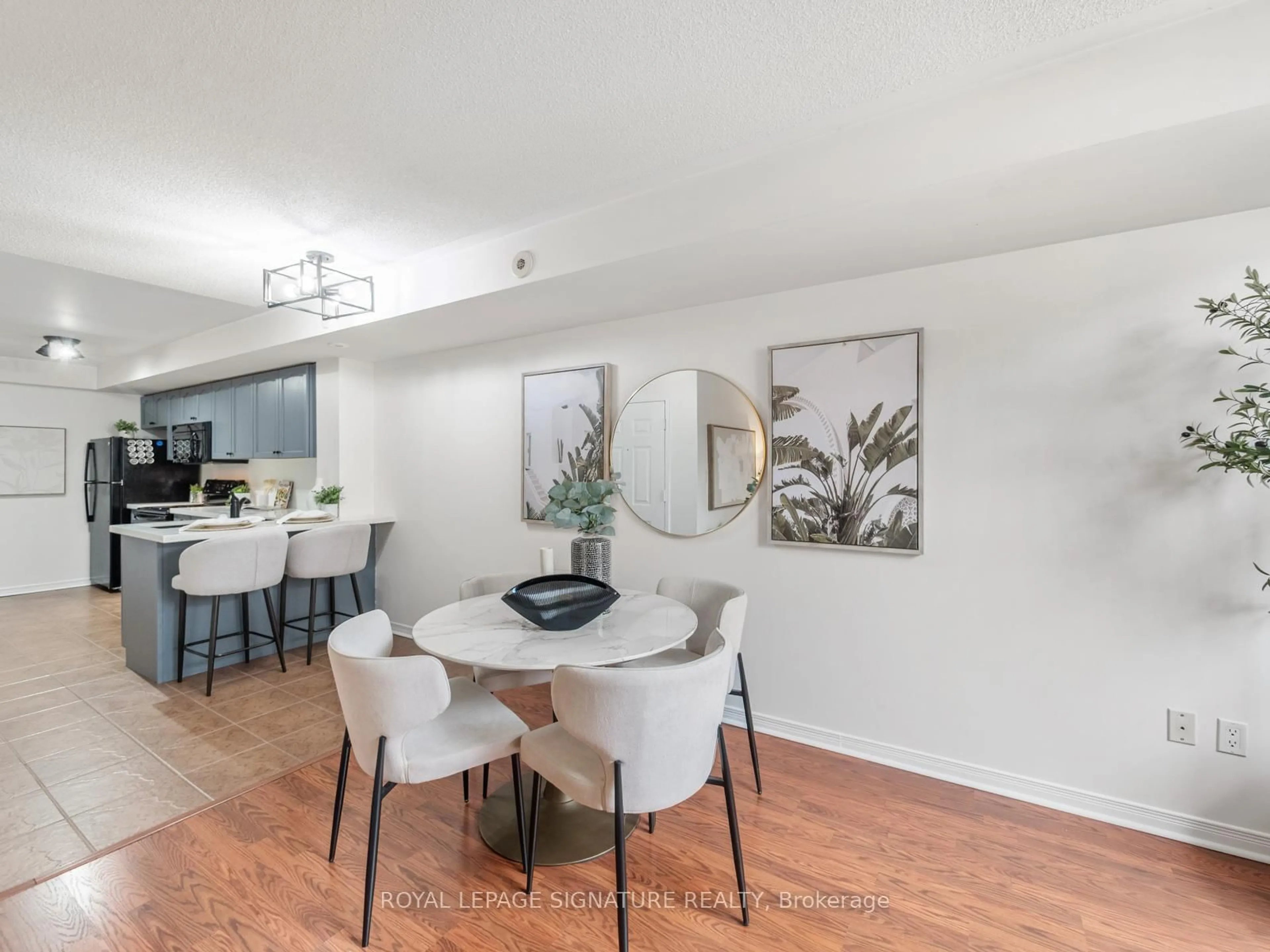 Dining room, wood/laminate floor for 45 Strangford Lane #201, Toronto Ontario M1L 0E5