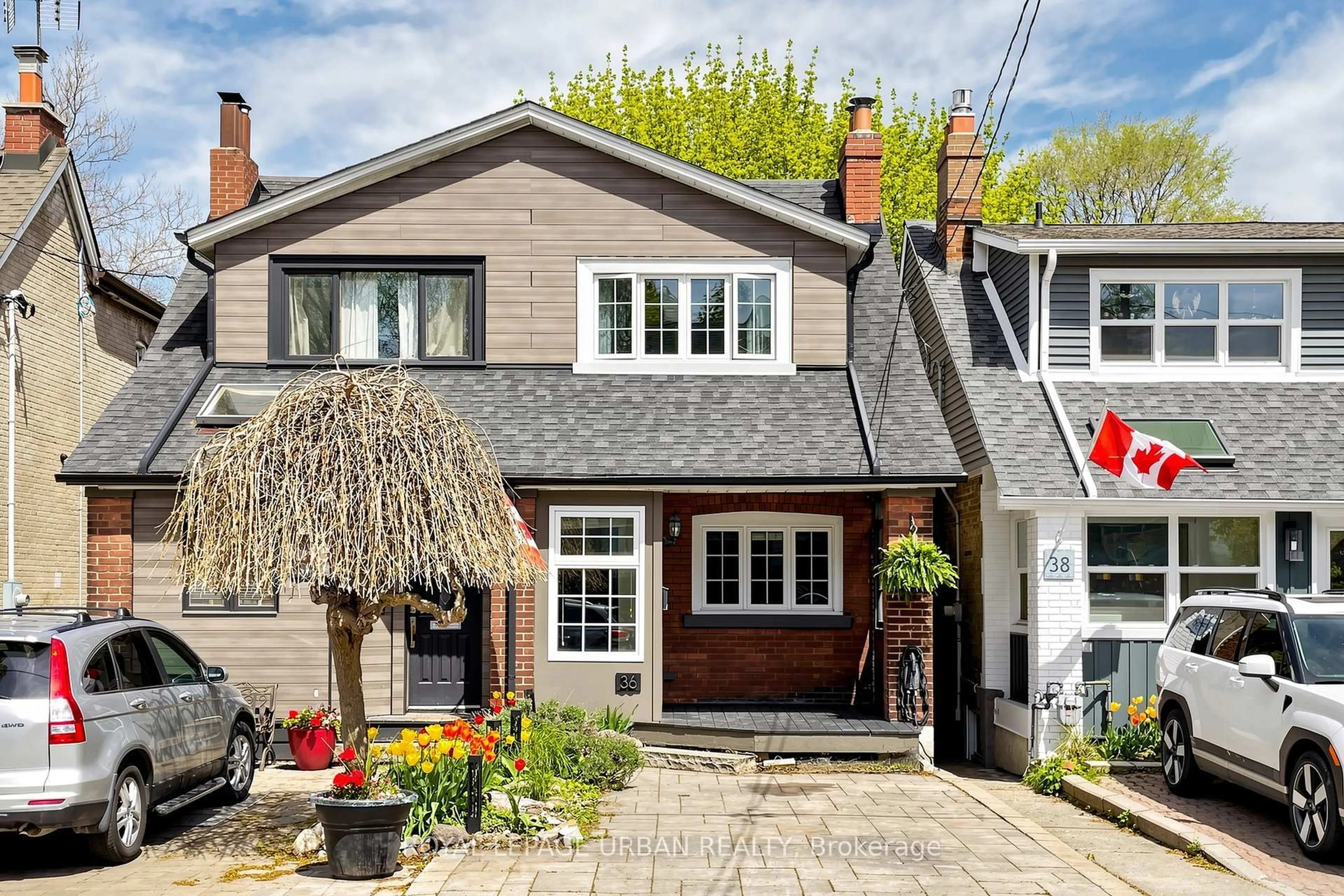 Home with brick exterior material, street for 36 Norway Ave, Toronto Ontario M4L 1P9