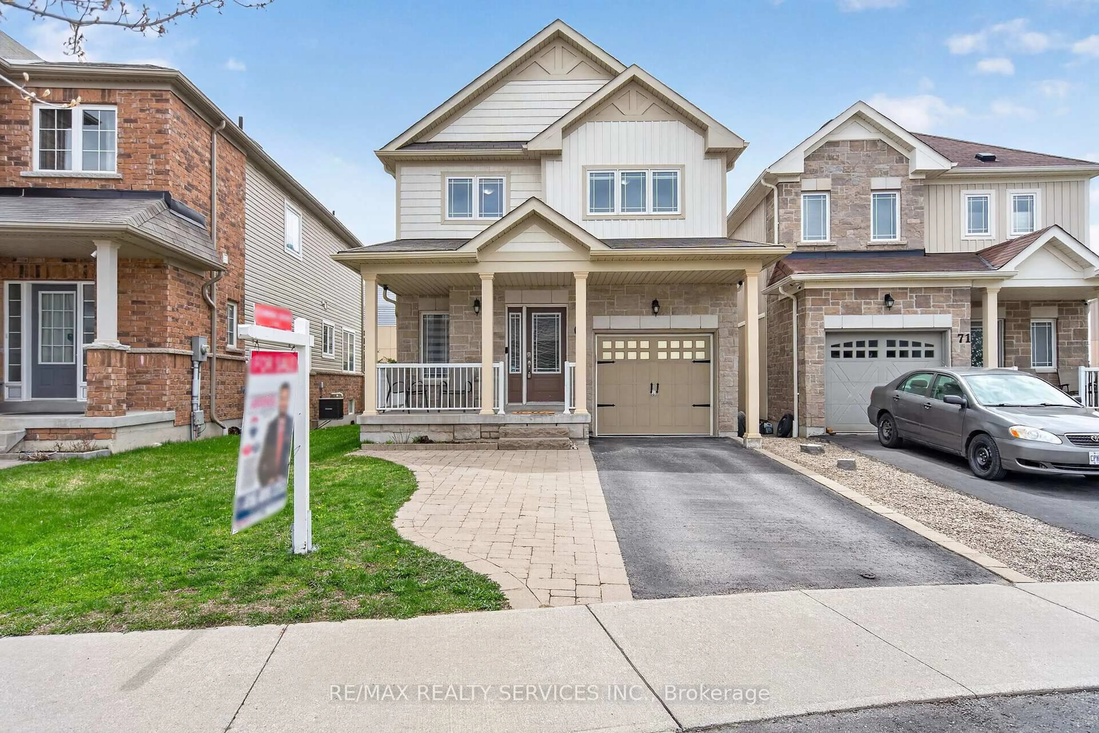 Home with brick exterior material, street for 69 Mantz Cres, Whitby Ontario L1R 0L2