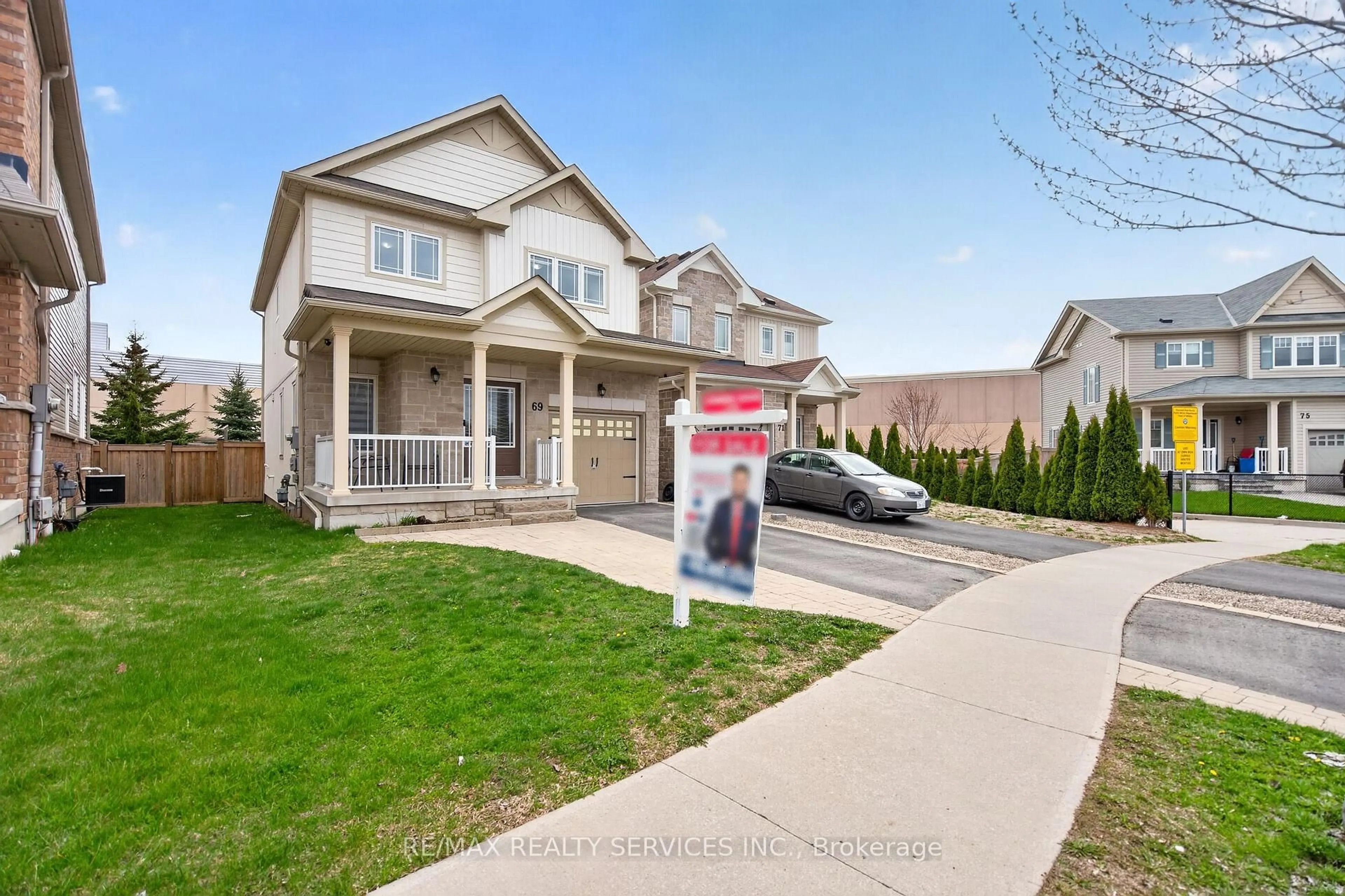 Home with vinyl exterior material, street for 69 Mantz Cres, Whitby Ontario L1R 0L2
