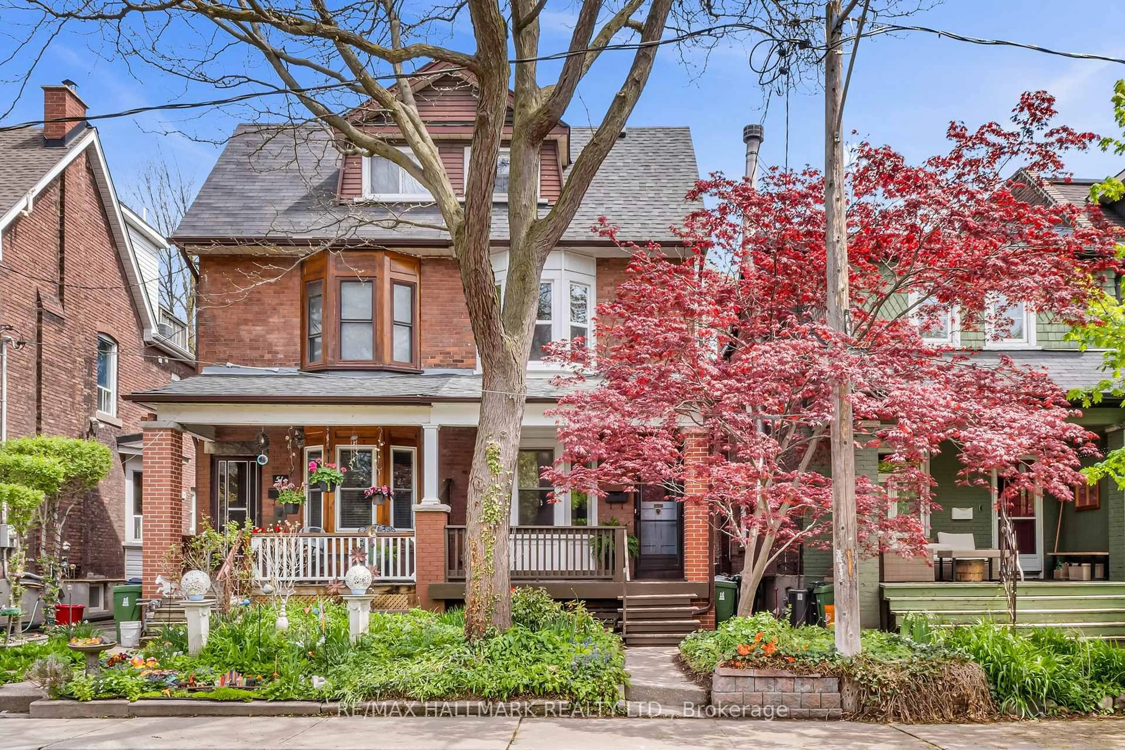 Home with brick exterior material, street for 49 Ravina Cres, Toronto Ontario M4J 3L9