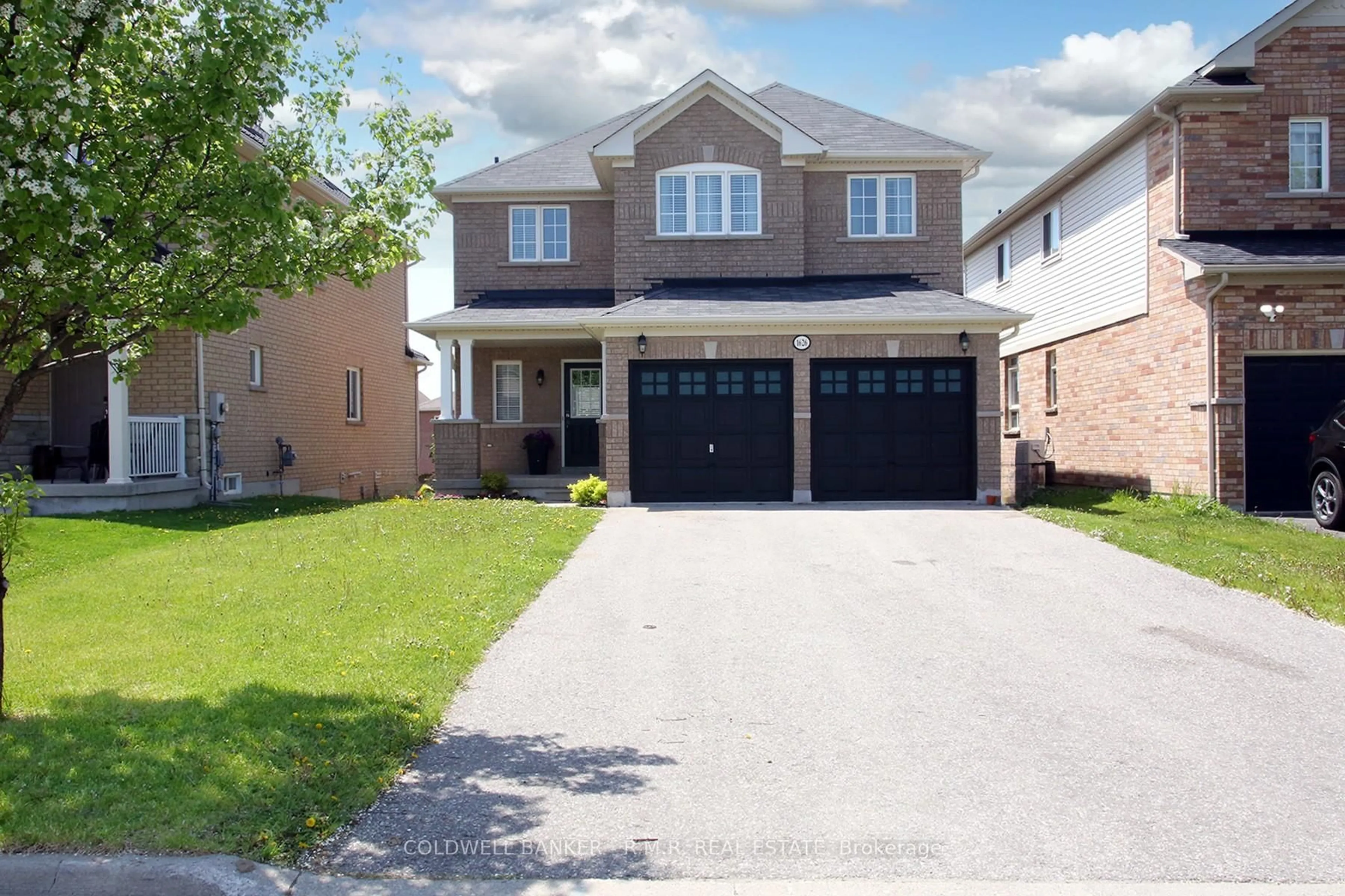 Home with brick exterior material, street for 1626 Quail Run Dr, Oshawa Ontario L1K 0L9