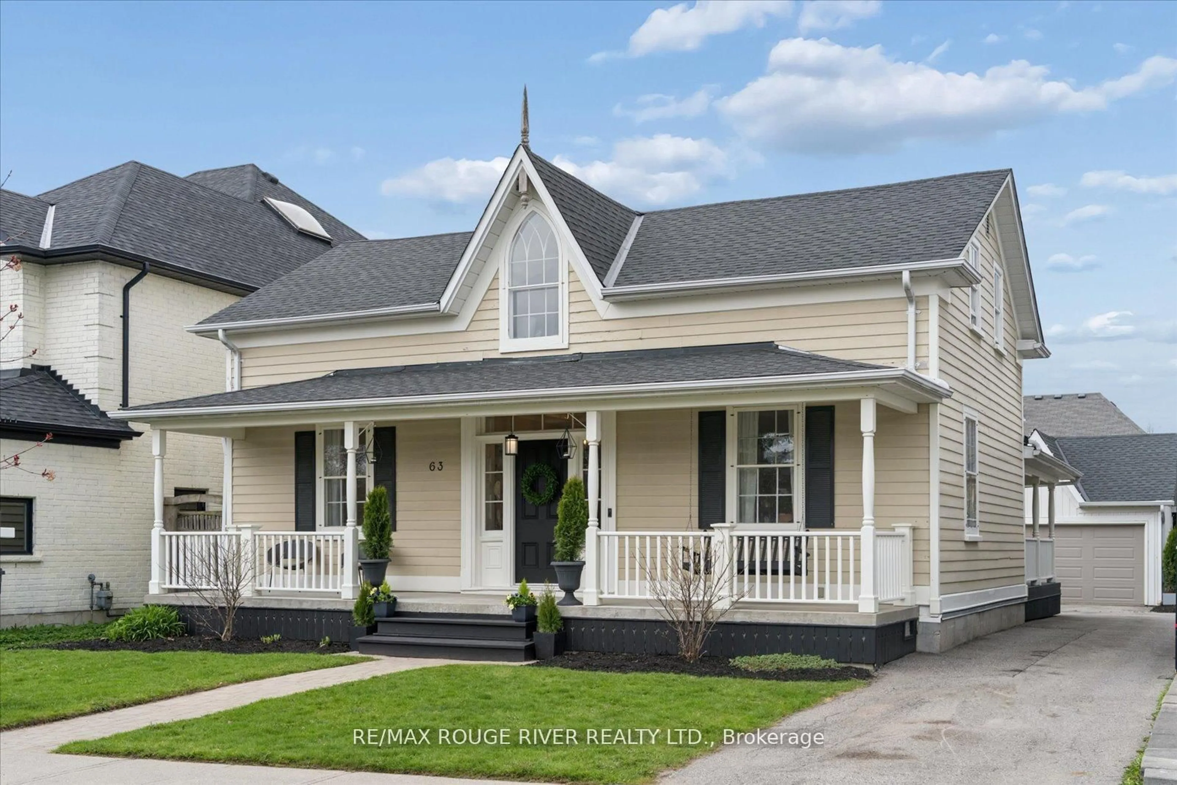Home with vinyl exterior material, street for 63 Downey Dr, Whitby Ontario L1M 1J2