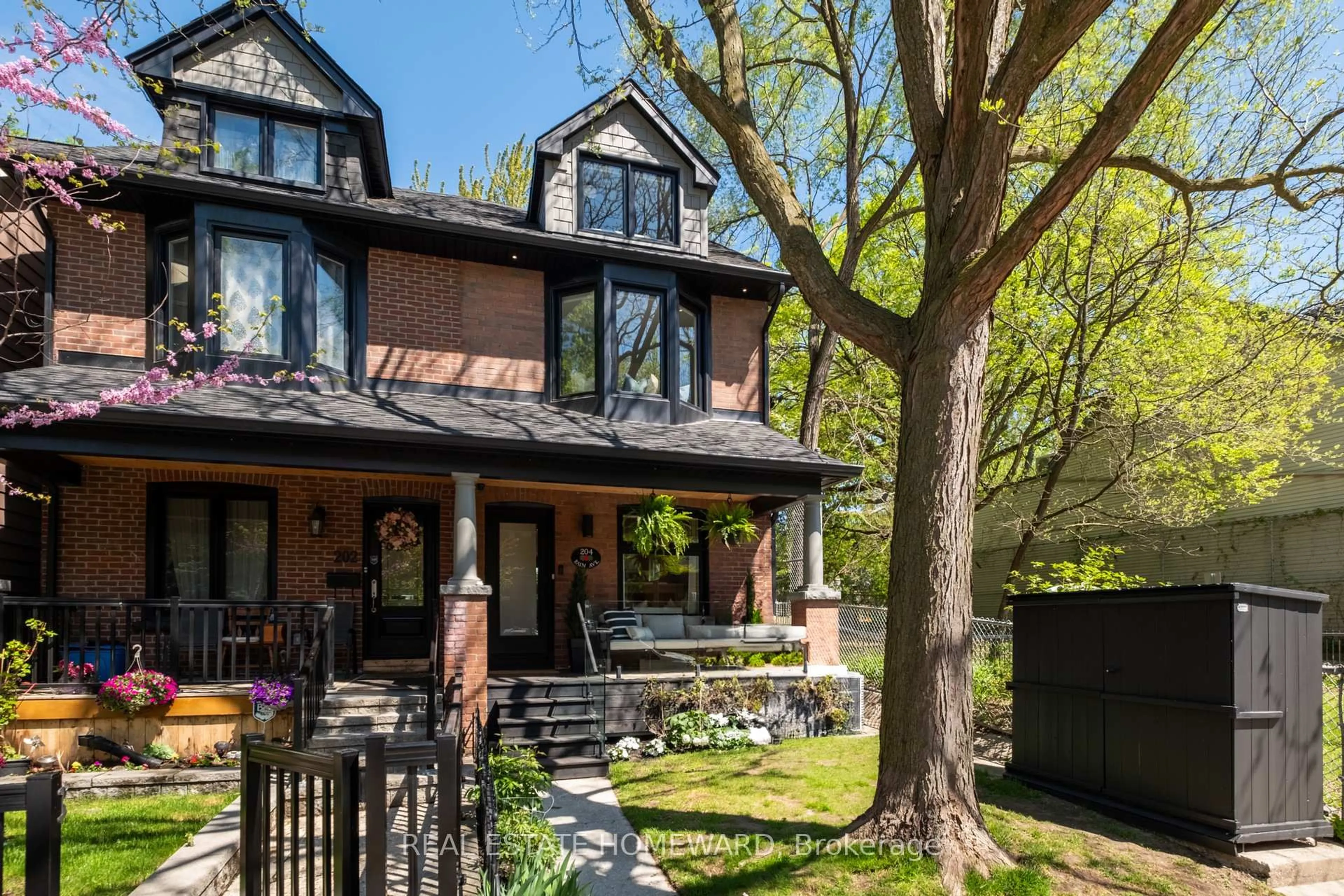 Home with brick exterior material, street for 204 Bain Ave, Toronto Ontario M4K 1G1