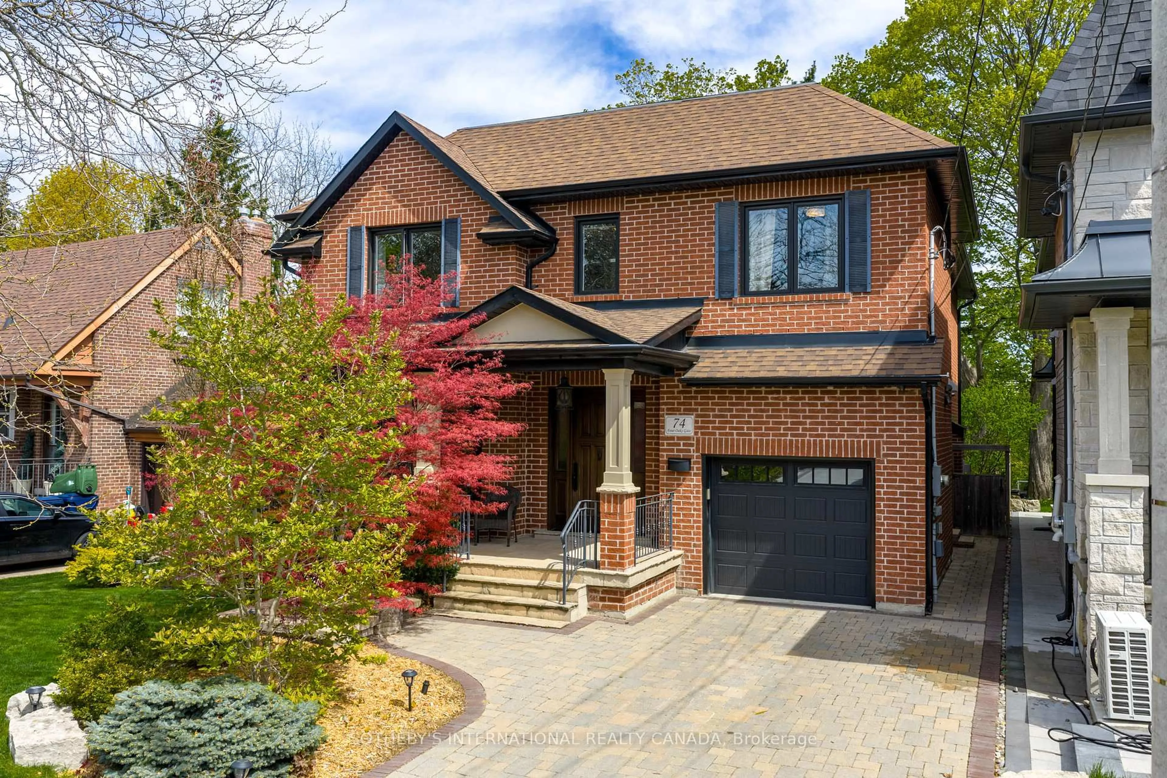 Home with brick exterior material, street for 74 Four Oaks Gate, Toronto Ontario M4J 2X2