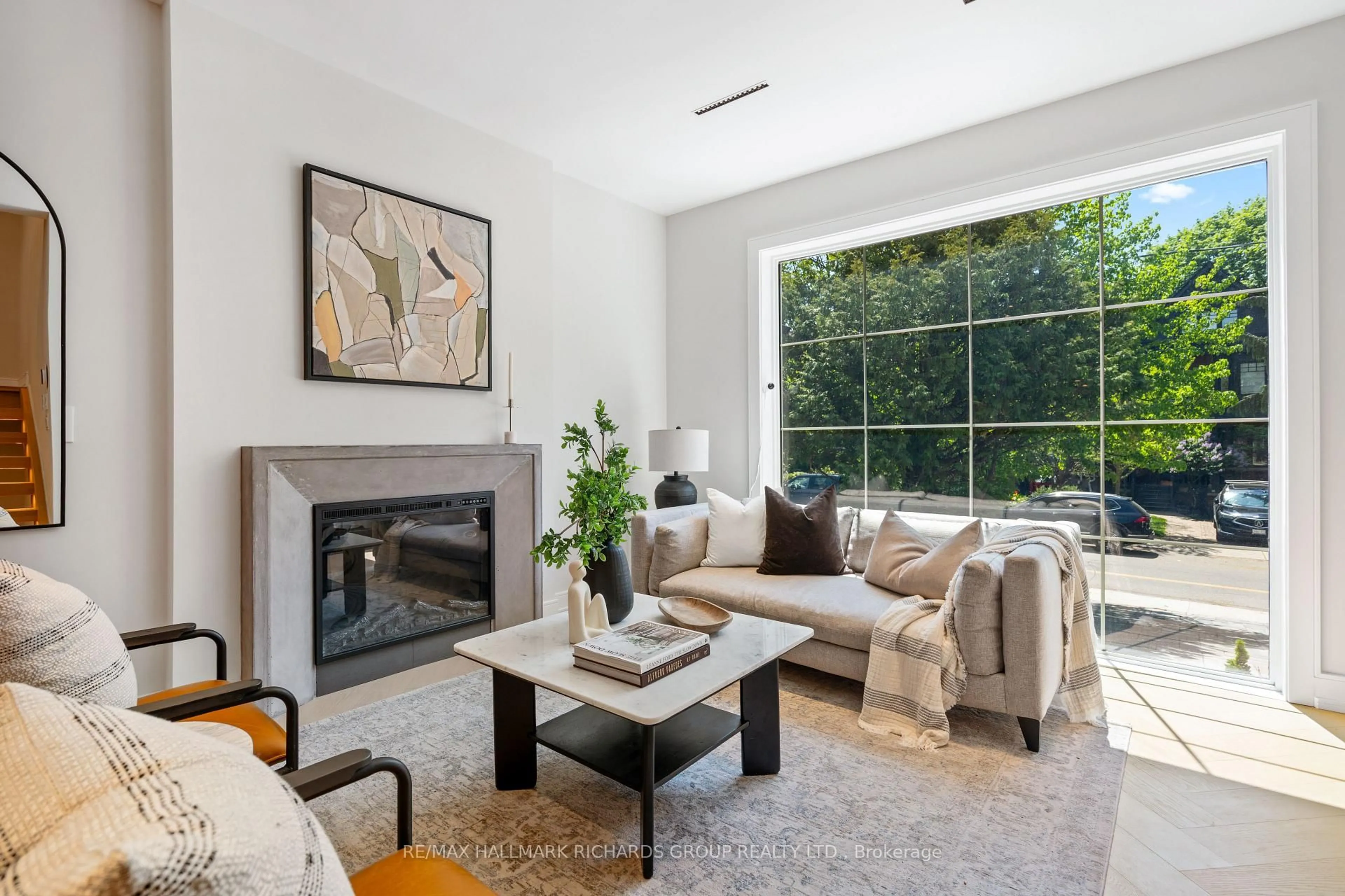 Living room with furniture, unknown for 98 Dixon Ave, Toronto Ontario M4L 1N7