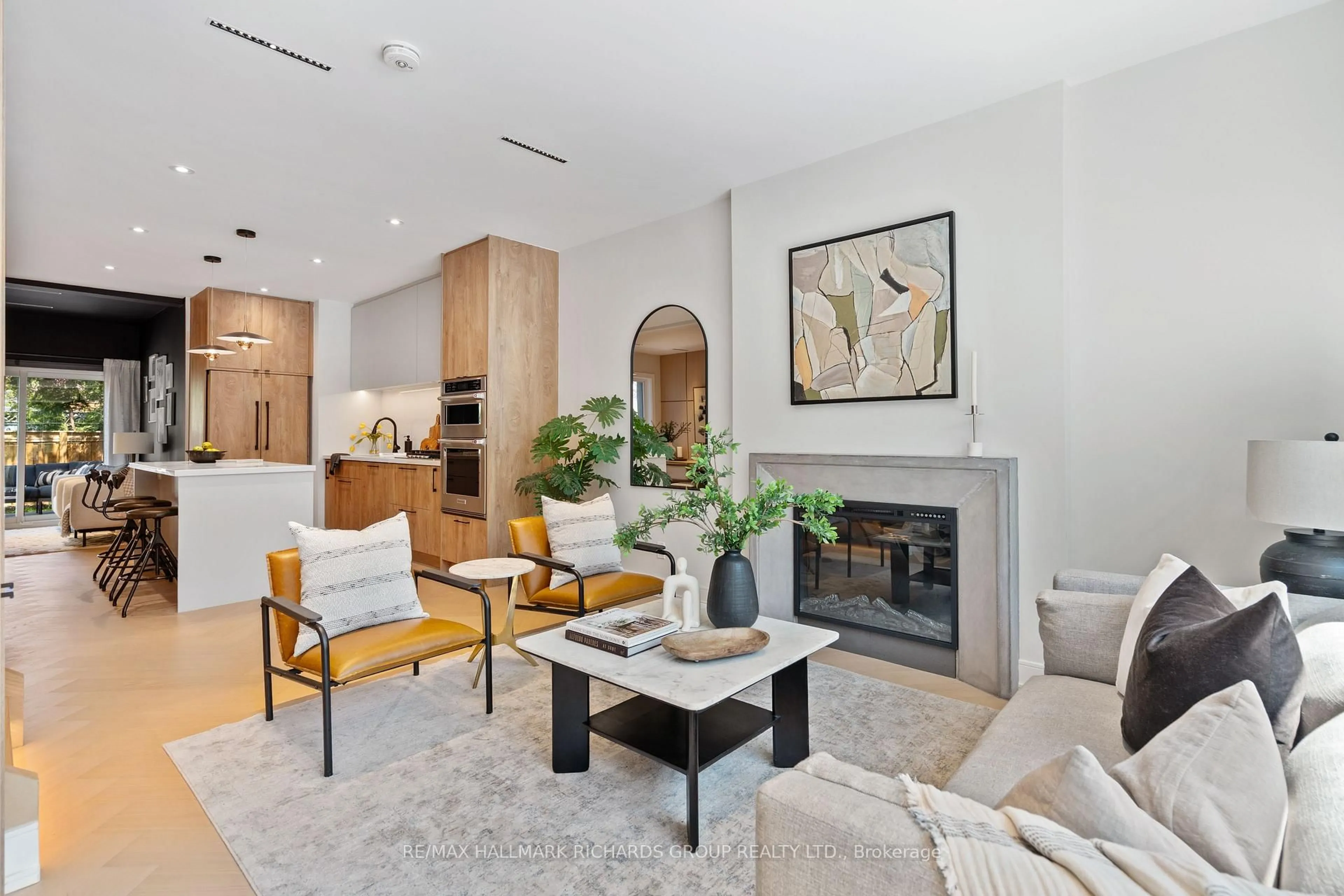 Living room with furniture, ceramic/tile floor for 98 Dixon Ave, Toronto Ontario M4L 1N7