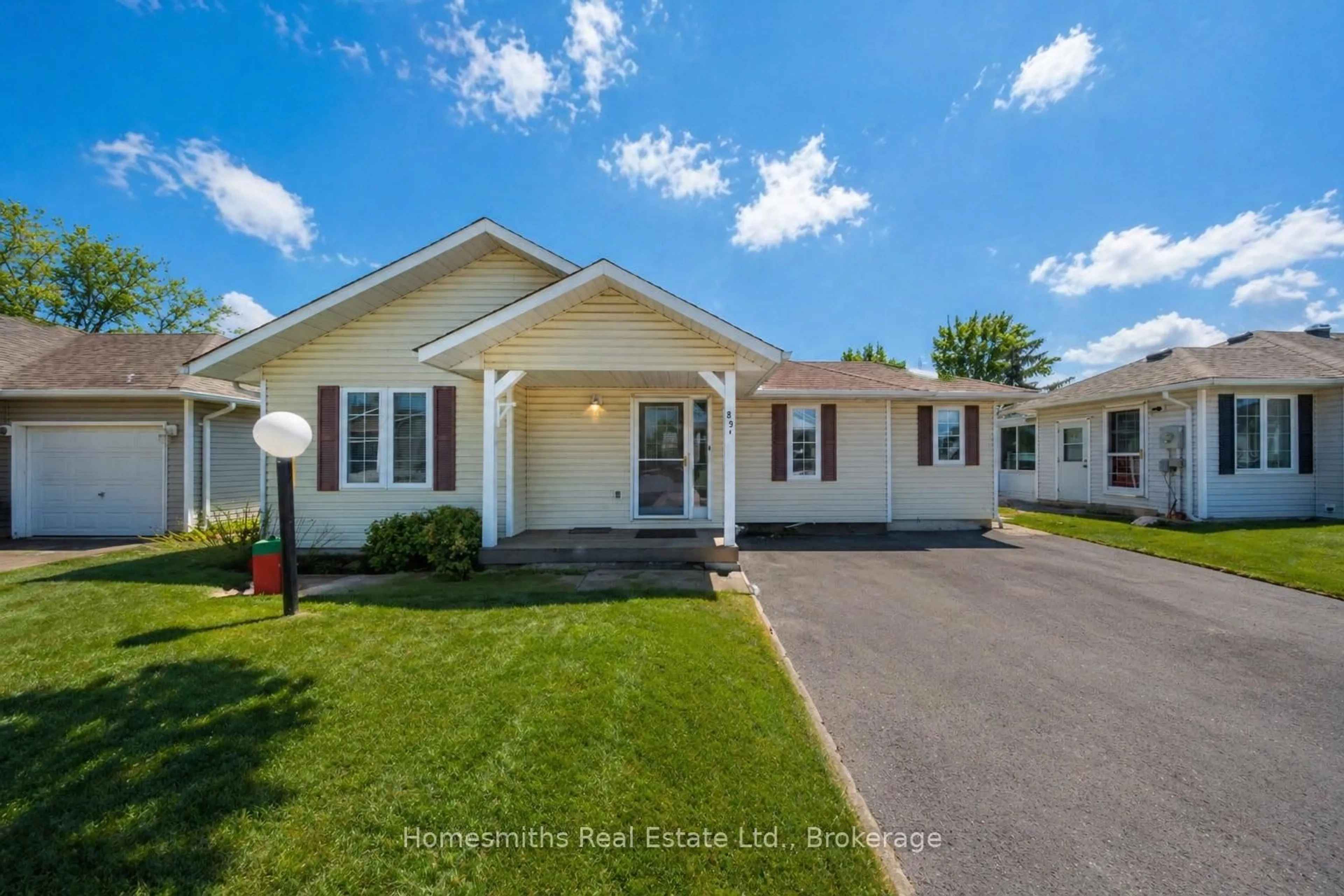 Home with vinyl exterior material, street for 89A Wilmot Tr, Clarington Ontario L1B 1B8