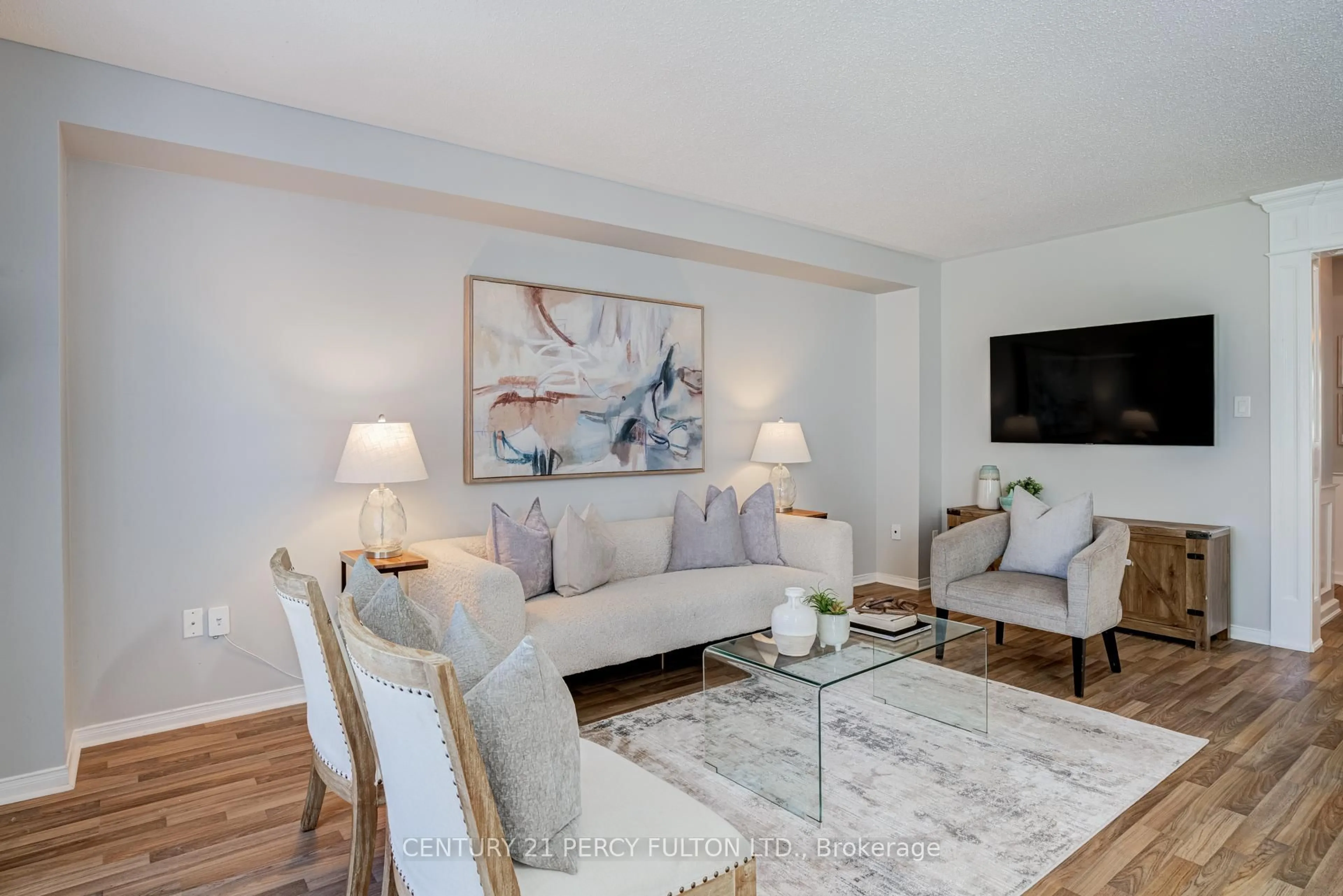 Living room with furniture, wood/laminate floor for 49 Bettina Pl, Whitby Ontario L1R 0E9