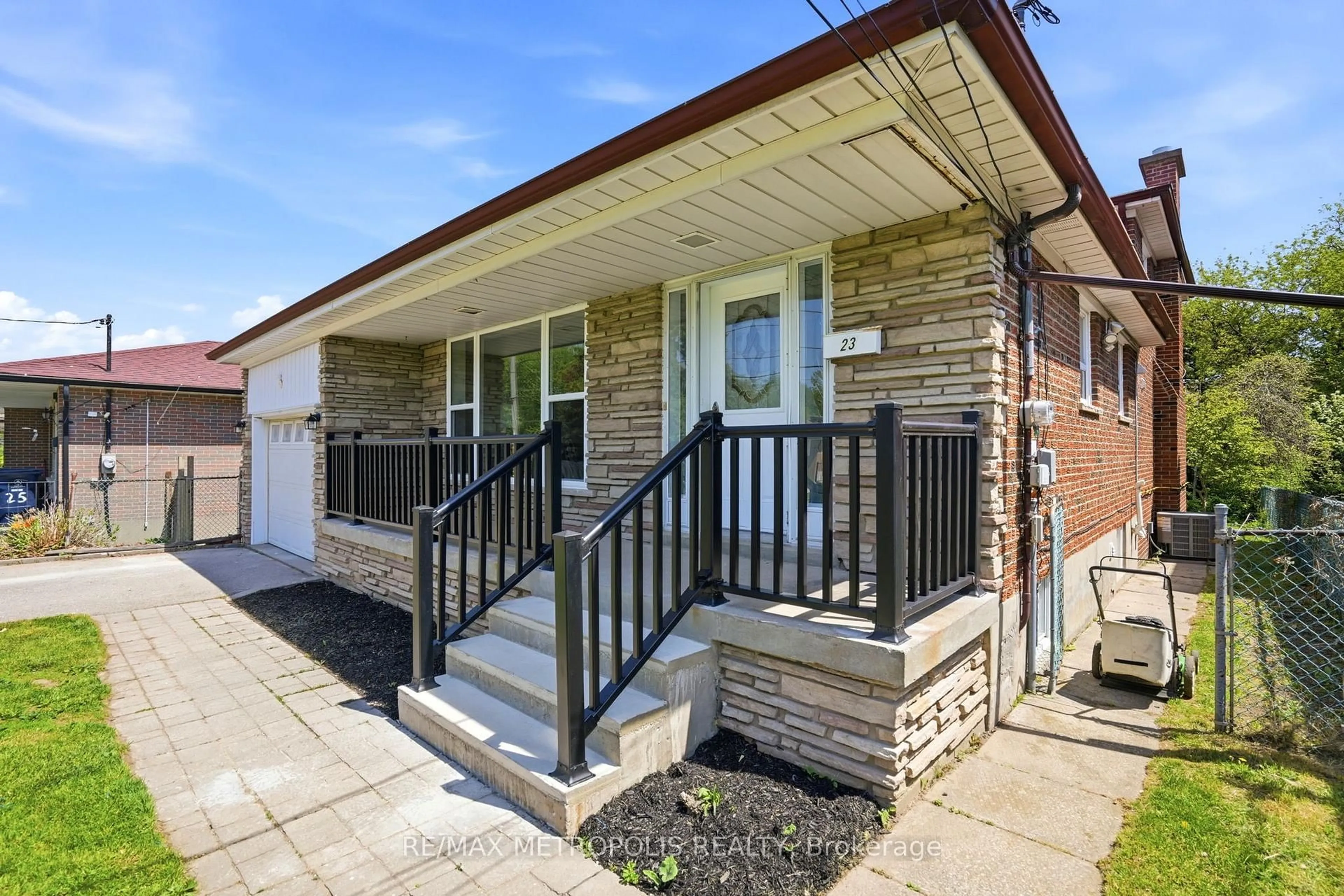 Home with brick exterior material, street for 23 Lochleven Dr, Toronto Ontario M1M 3R9
