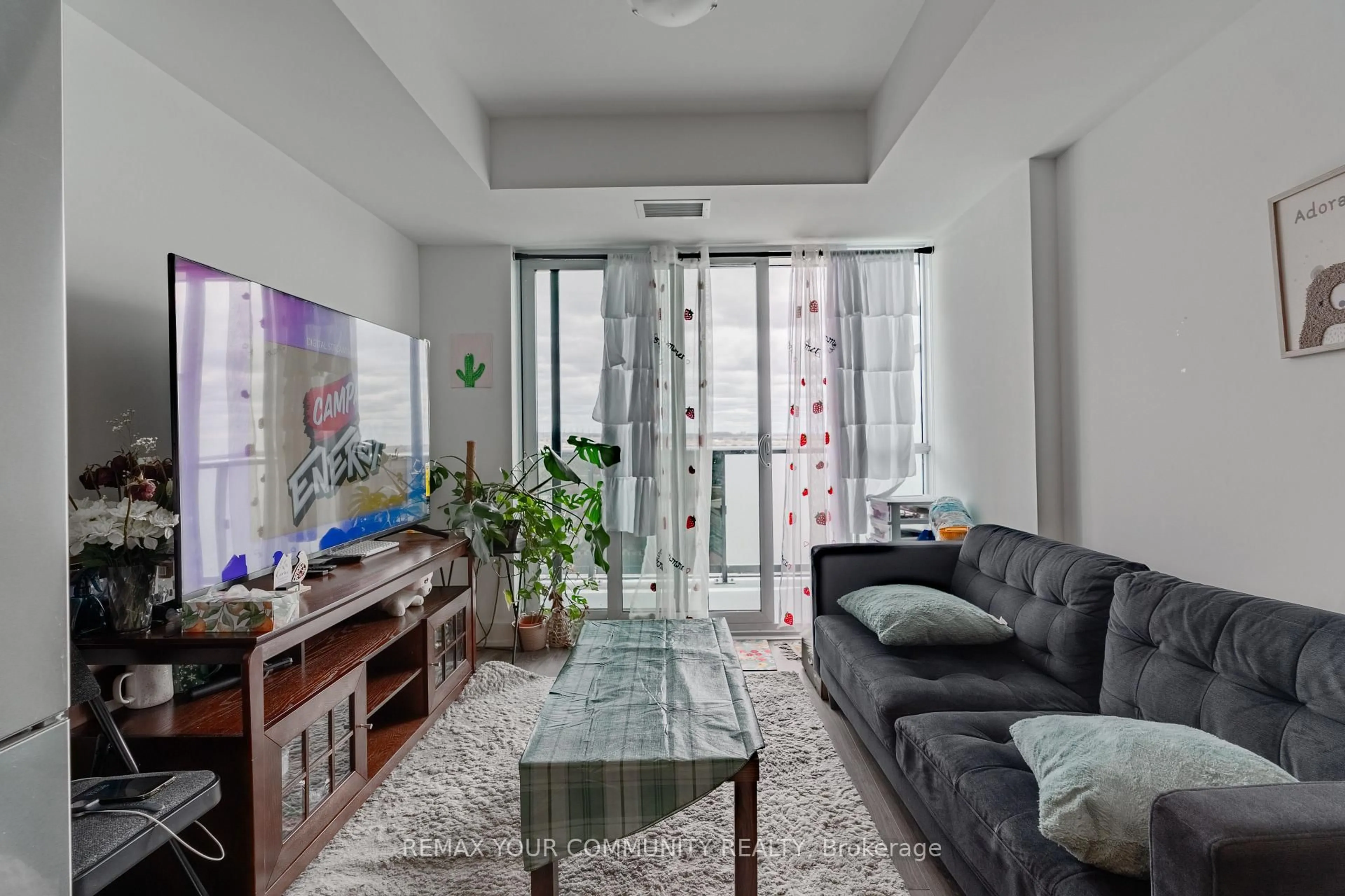 Living room with furniture, unknown for 2545 Simcoe St #2302, Oshawa Ontario L1L 0W3
