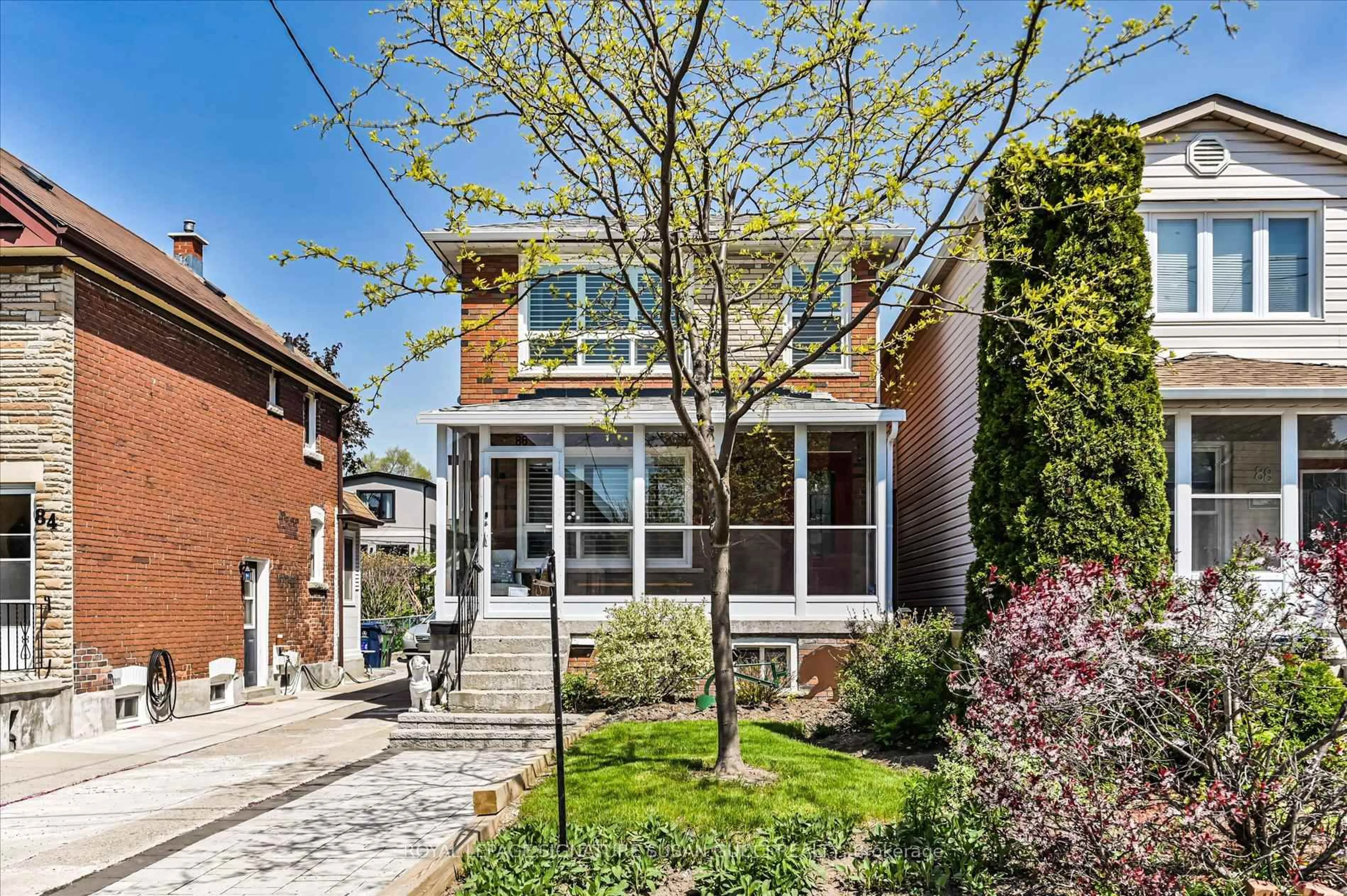 Home with brick exterior material, street for 86 Barker Ave, Toronto Ontario M4C 2N6