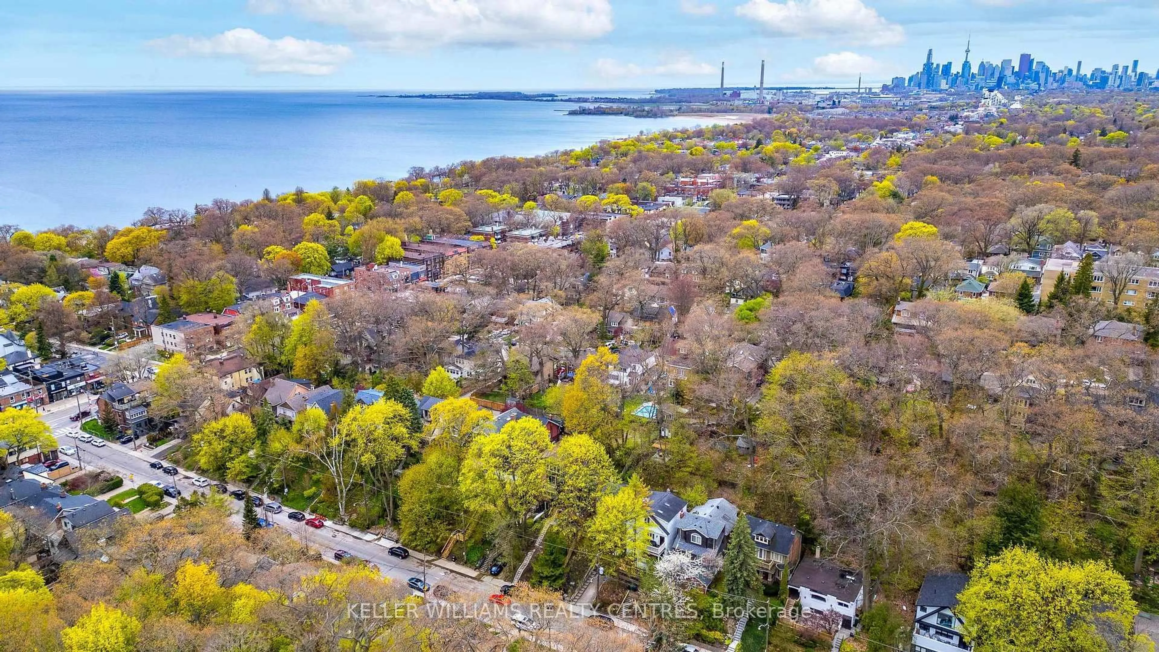 A pic from outside/outdoor area/front of a property/back of a property/a pic from drone, water/lake/river/ocean view for 122A Neville Park Blvd, Toronto Ontario M4E 3P8