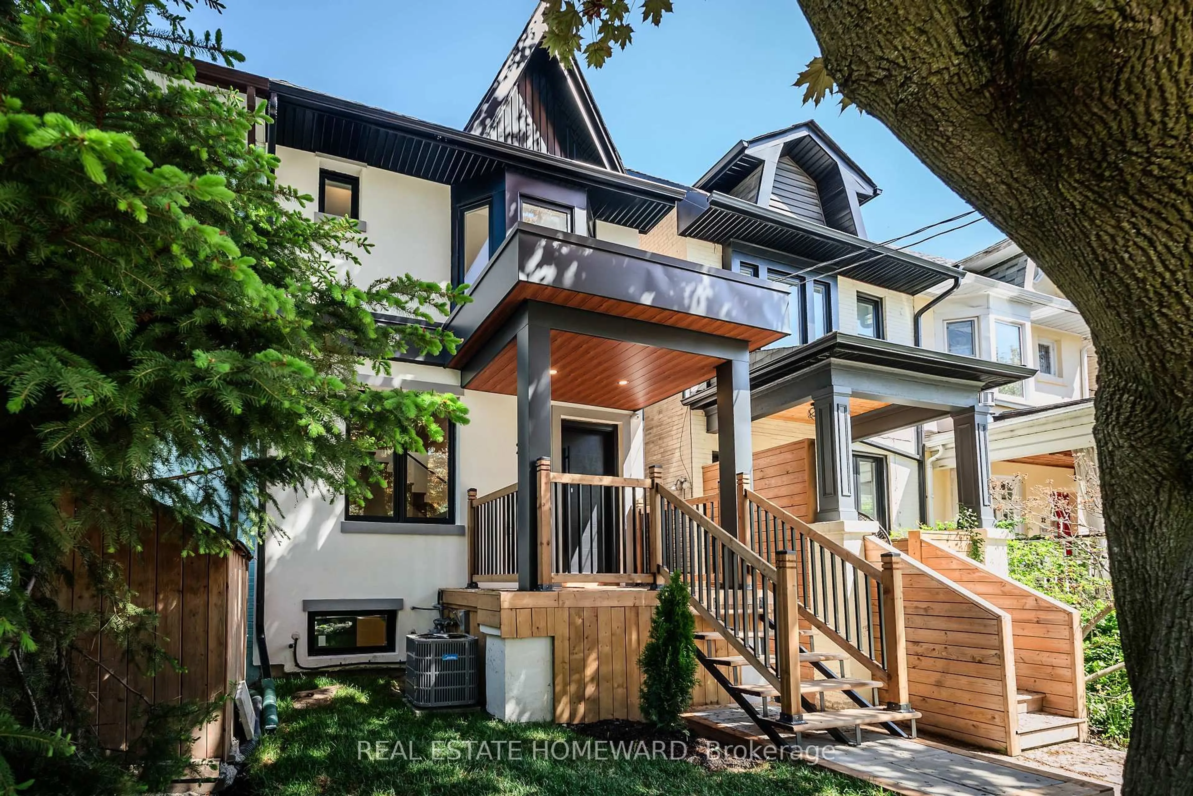 Home with brick exterior material, street for 28 Richard Ave, Toronto Ontario M4L 1W9