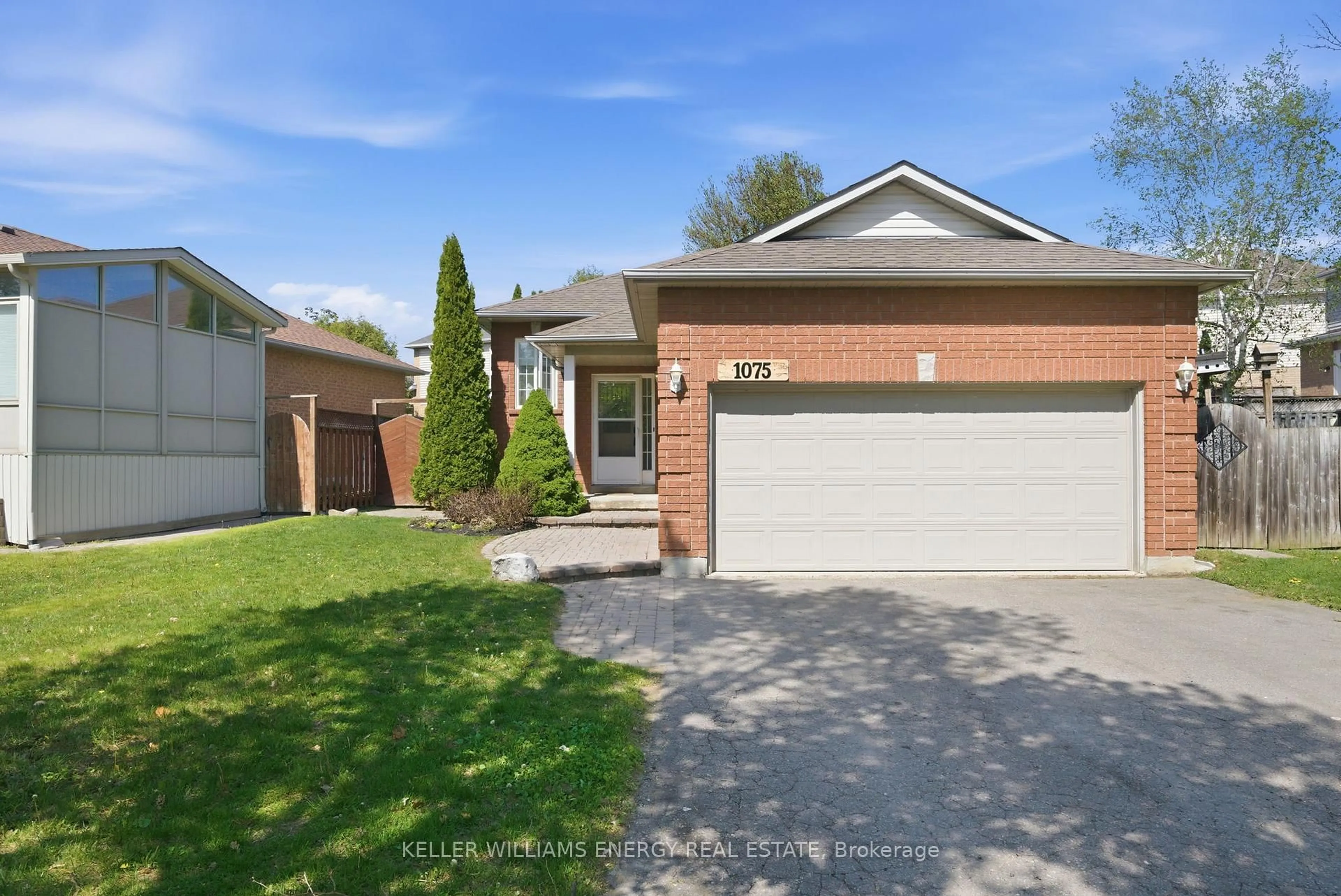 Home with brick exterior material, street for 1075 RIDGEMOUNT Blvd, Oshawa Ontario L1K 2K8