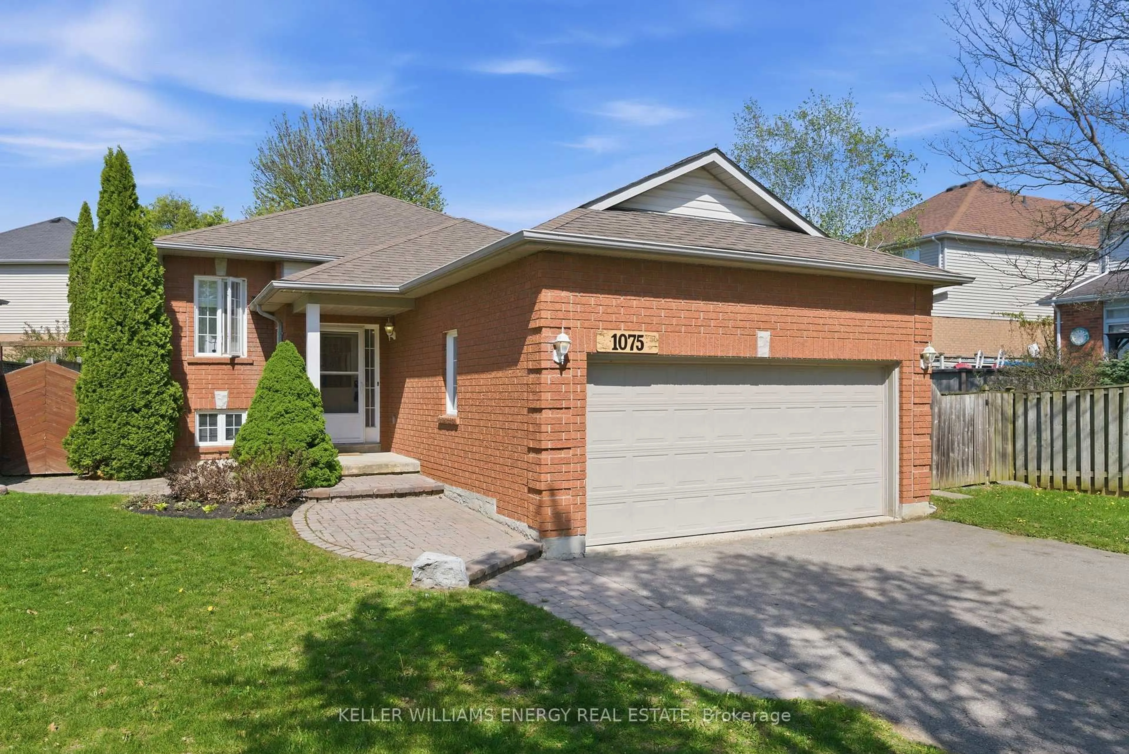 Home with brick exterior material, street for 1075 RIDGEMOUNT Blvd, Oshawa Ontario L1K 2K8