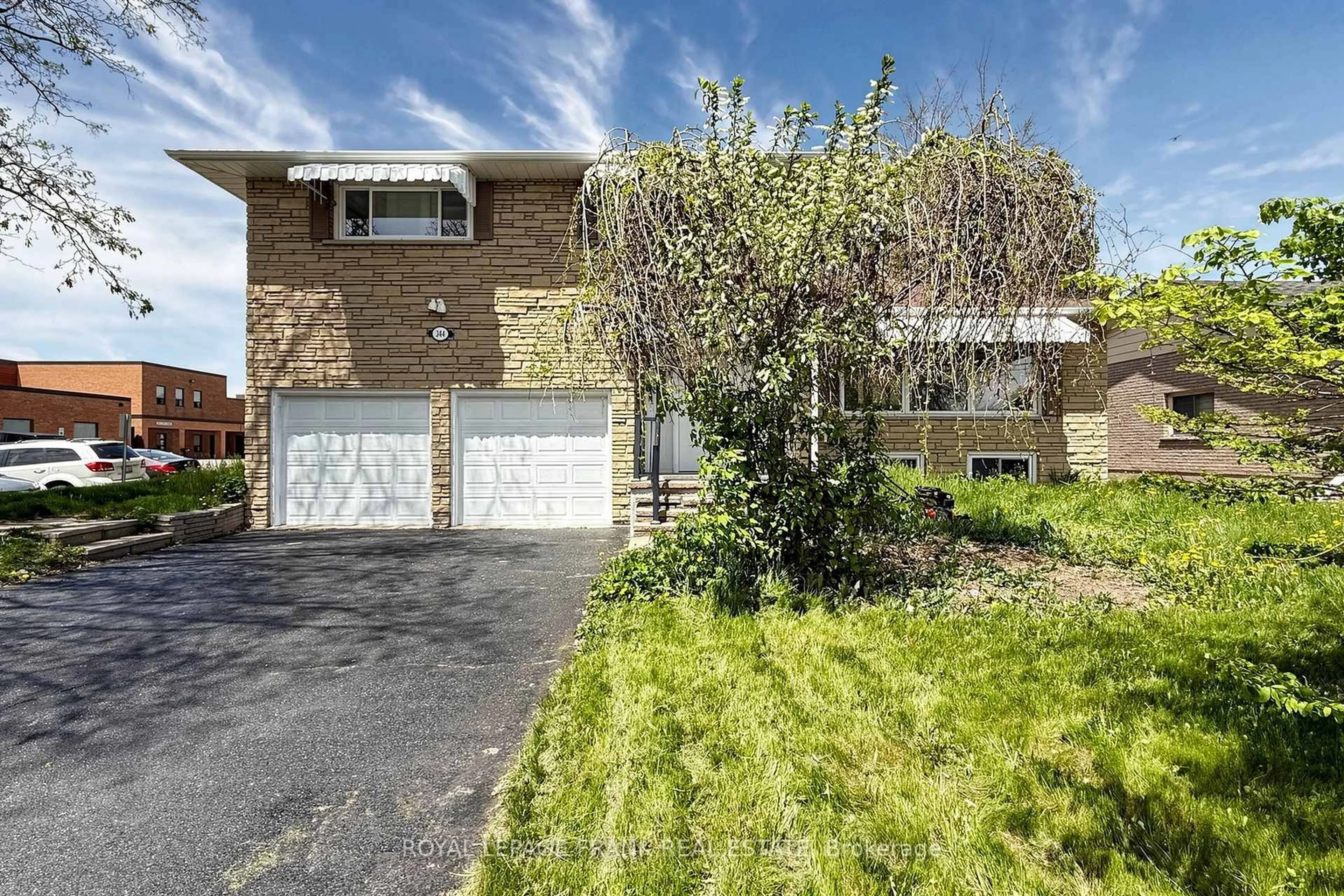 Home with brick exterior material, street for 344 Rossland Rd, Oshawa Ontario L1G 2X1