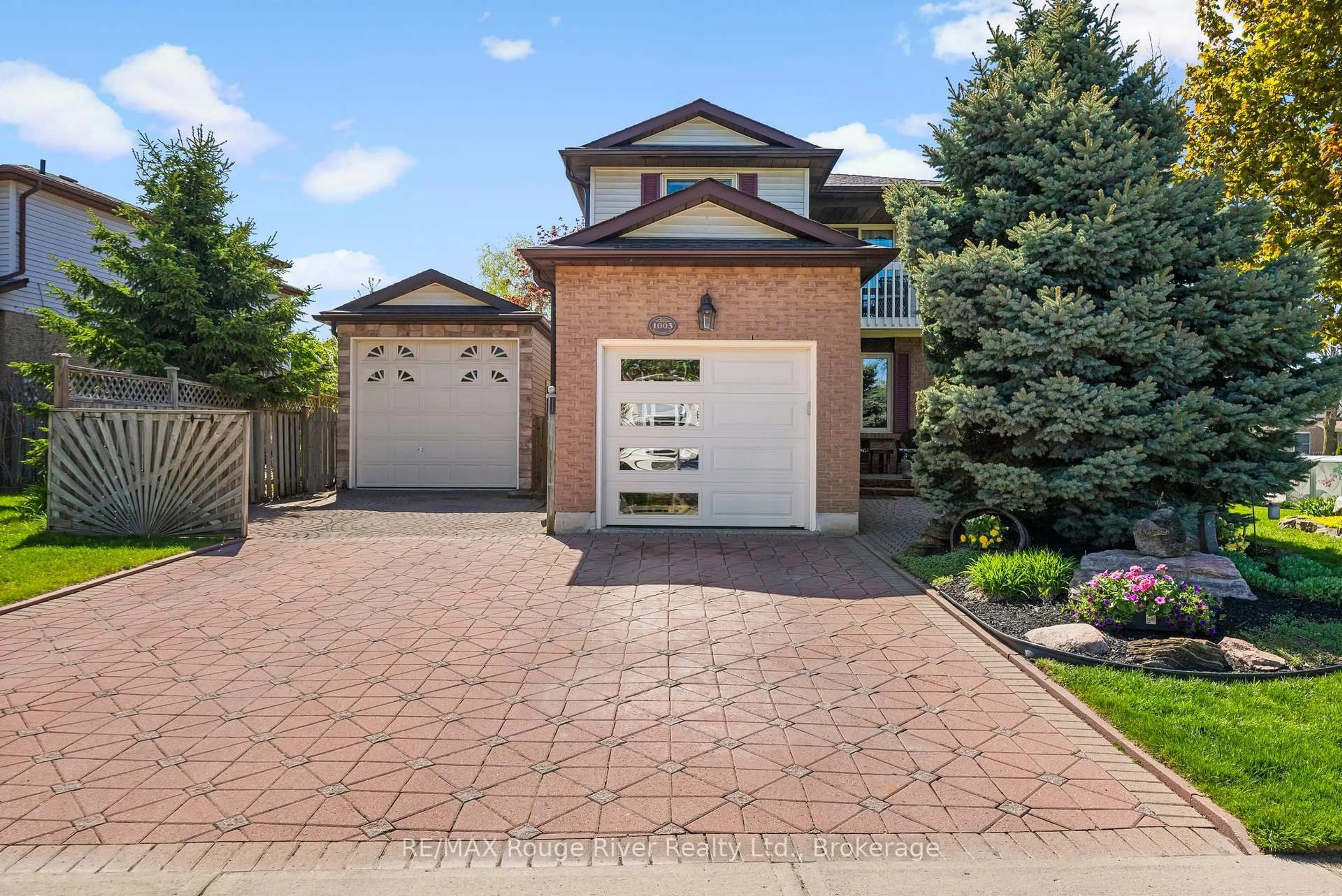 Home with brick exterior material, street for 1003 Renaissance Dr, Oshawa Ontario L1J 8B2