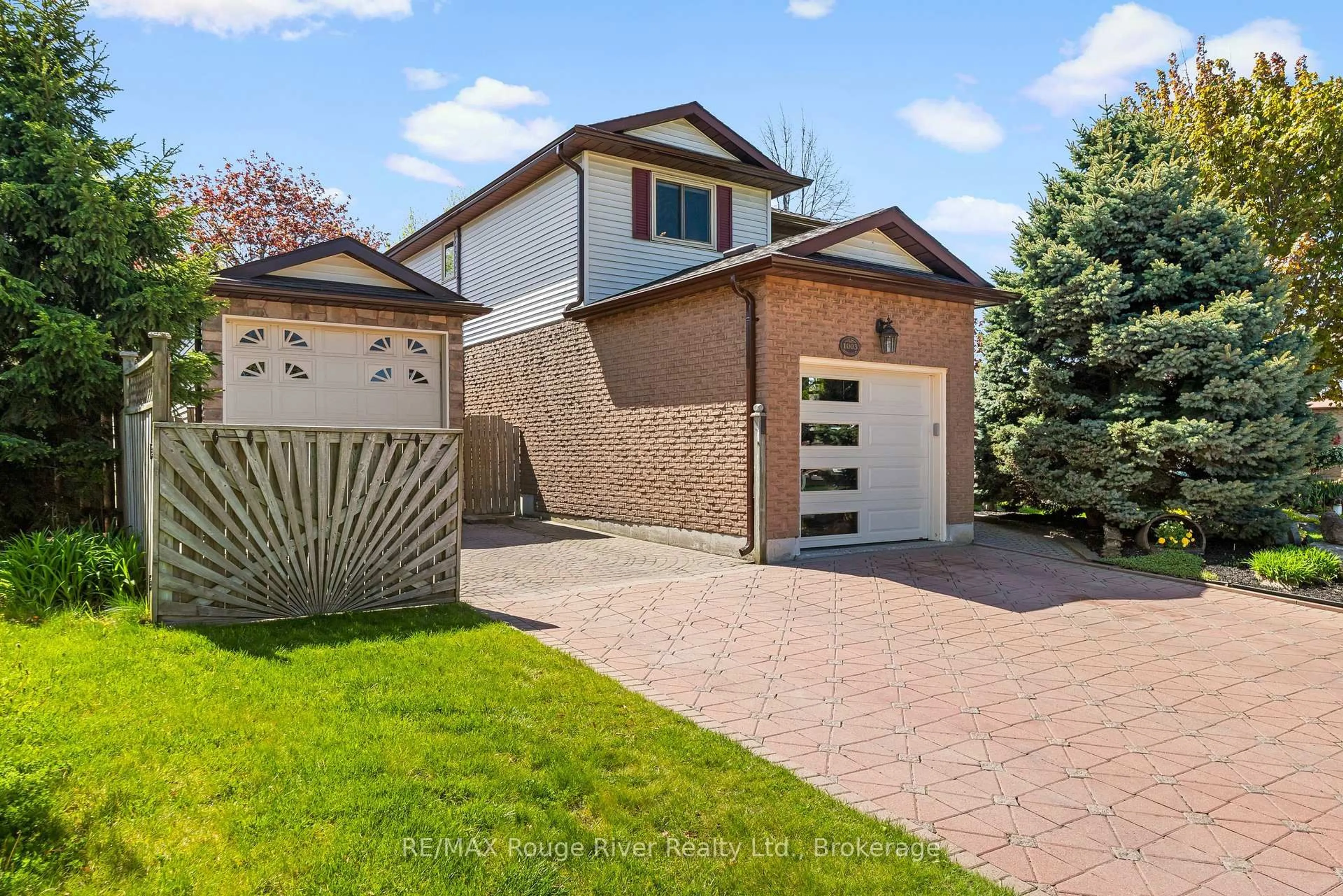 Home with brick exterior material, street for 1003 Renaissance Dr, Oshawa Ontario L1J 8B2