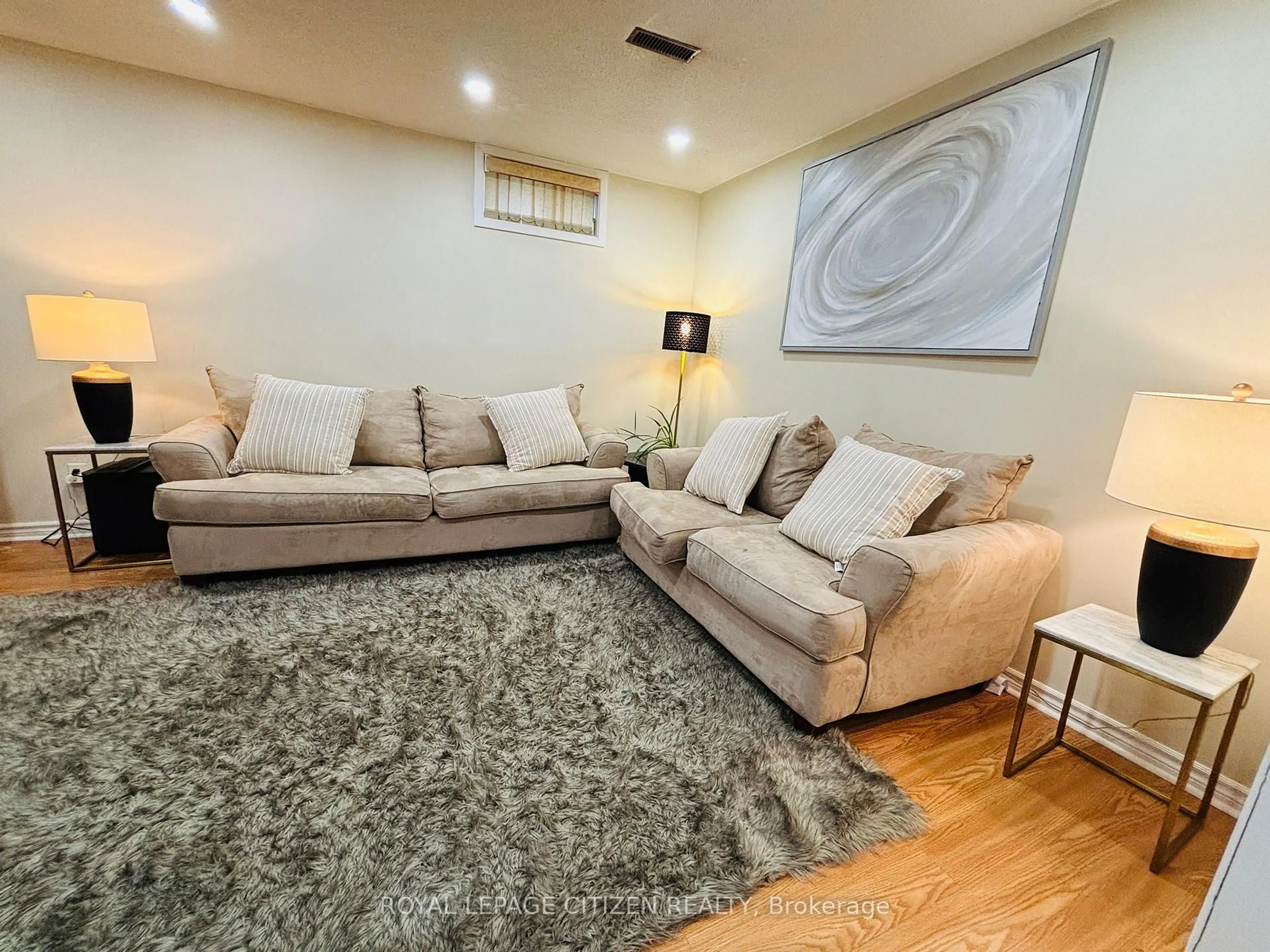 Living room with furniture, carpet floor for 229 Glen Hill Dr, Whitby Ontario L1N 7J5