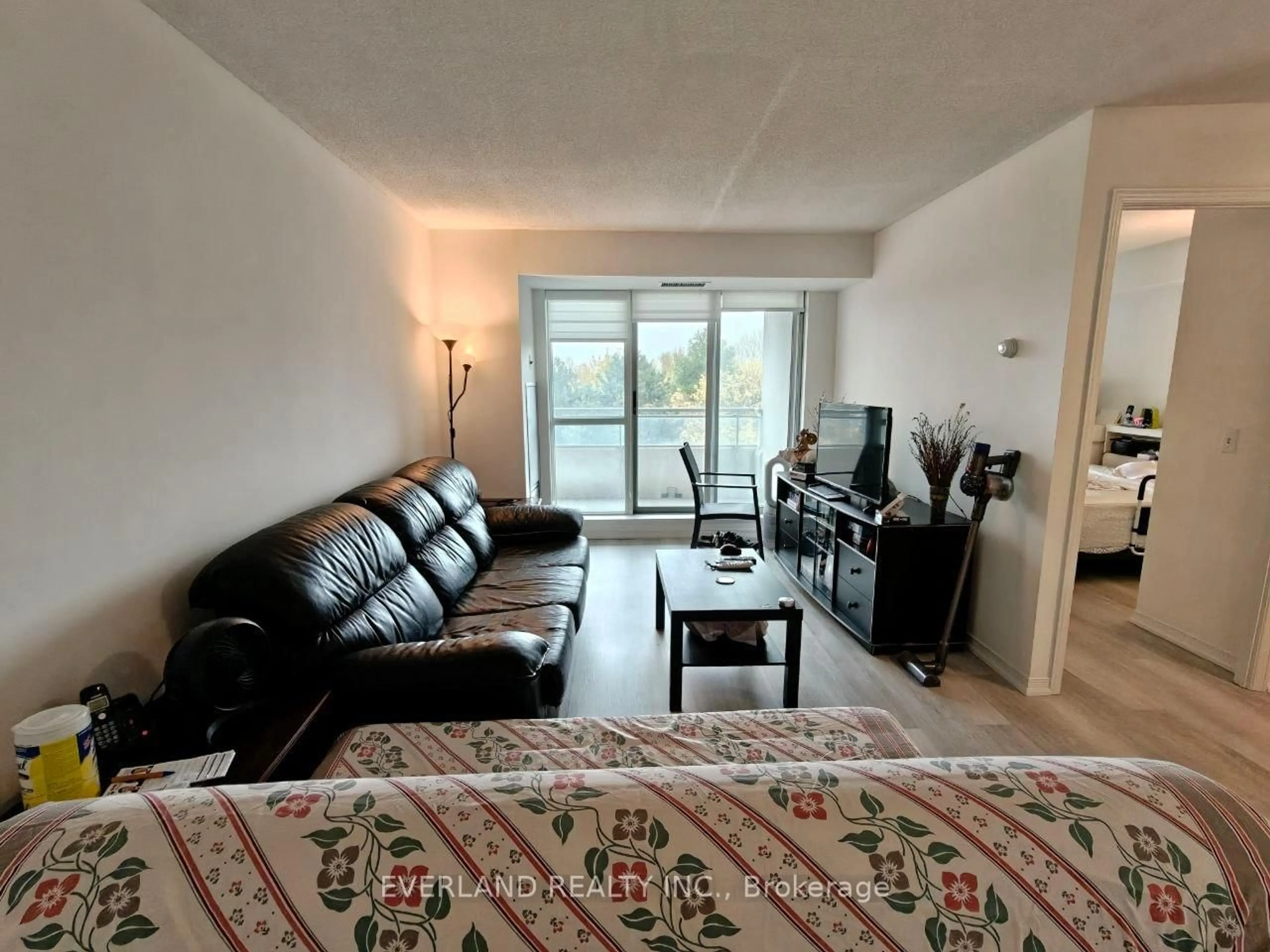 Living room with furniture, unknown for 5001 Finch St #512, Toronto Ontario M1S 5J9