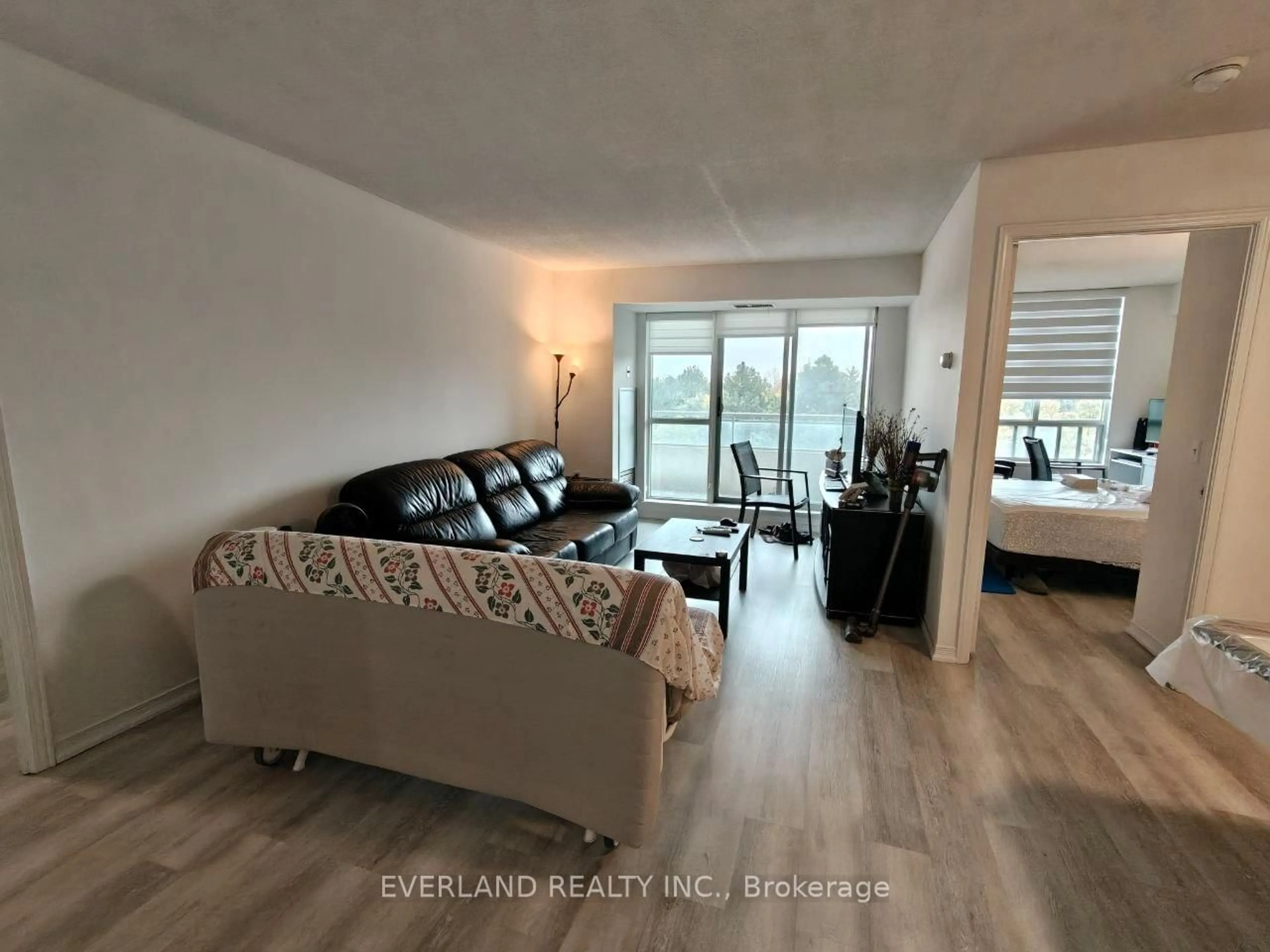 Living room with furniture, unknown for 5001 Finch St #512, Toronto Ontario M1S 5J9