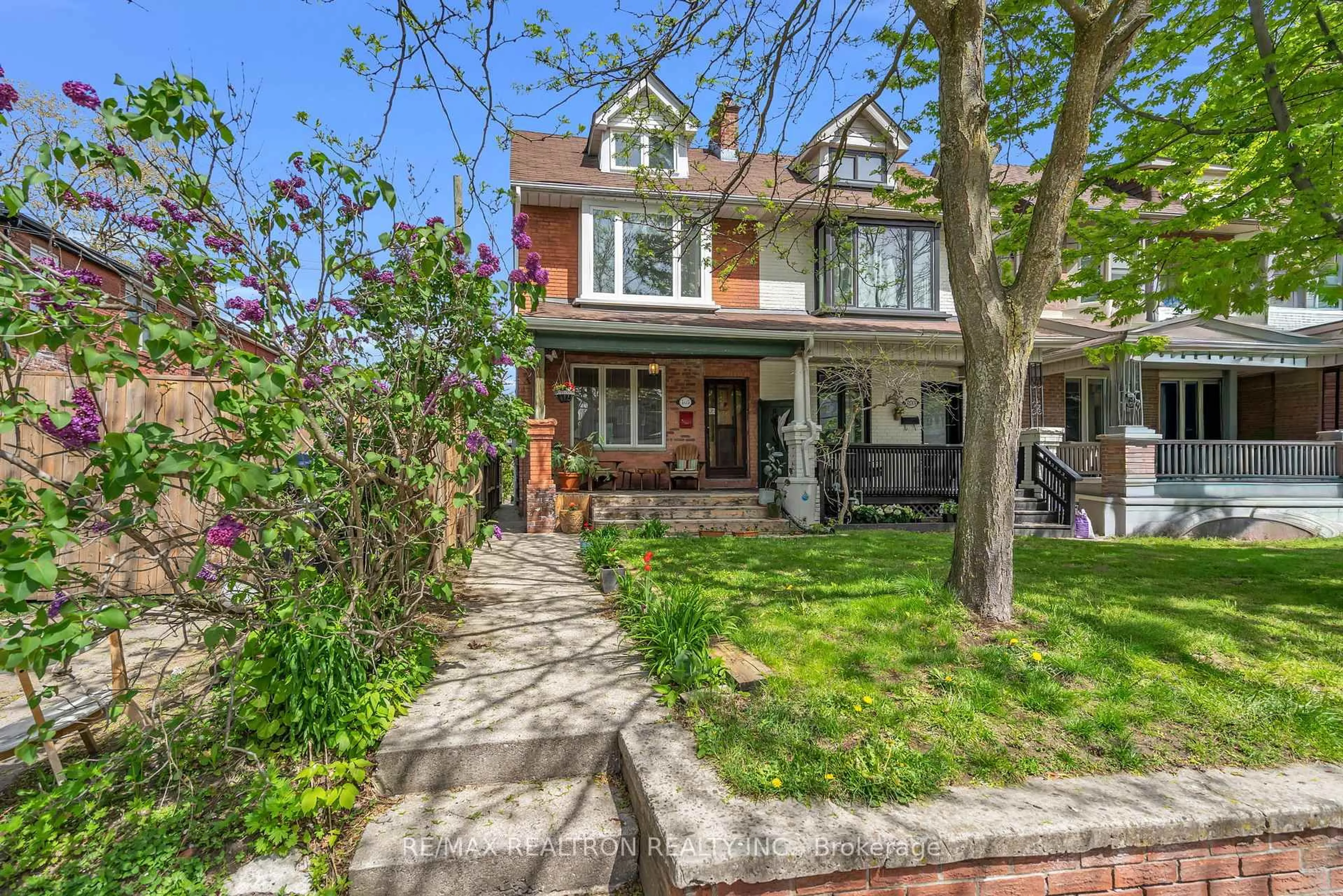 Home with brick exterior material, street for 105 Dewhurst Blvd, Toronto Ontario M4J 3J5